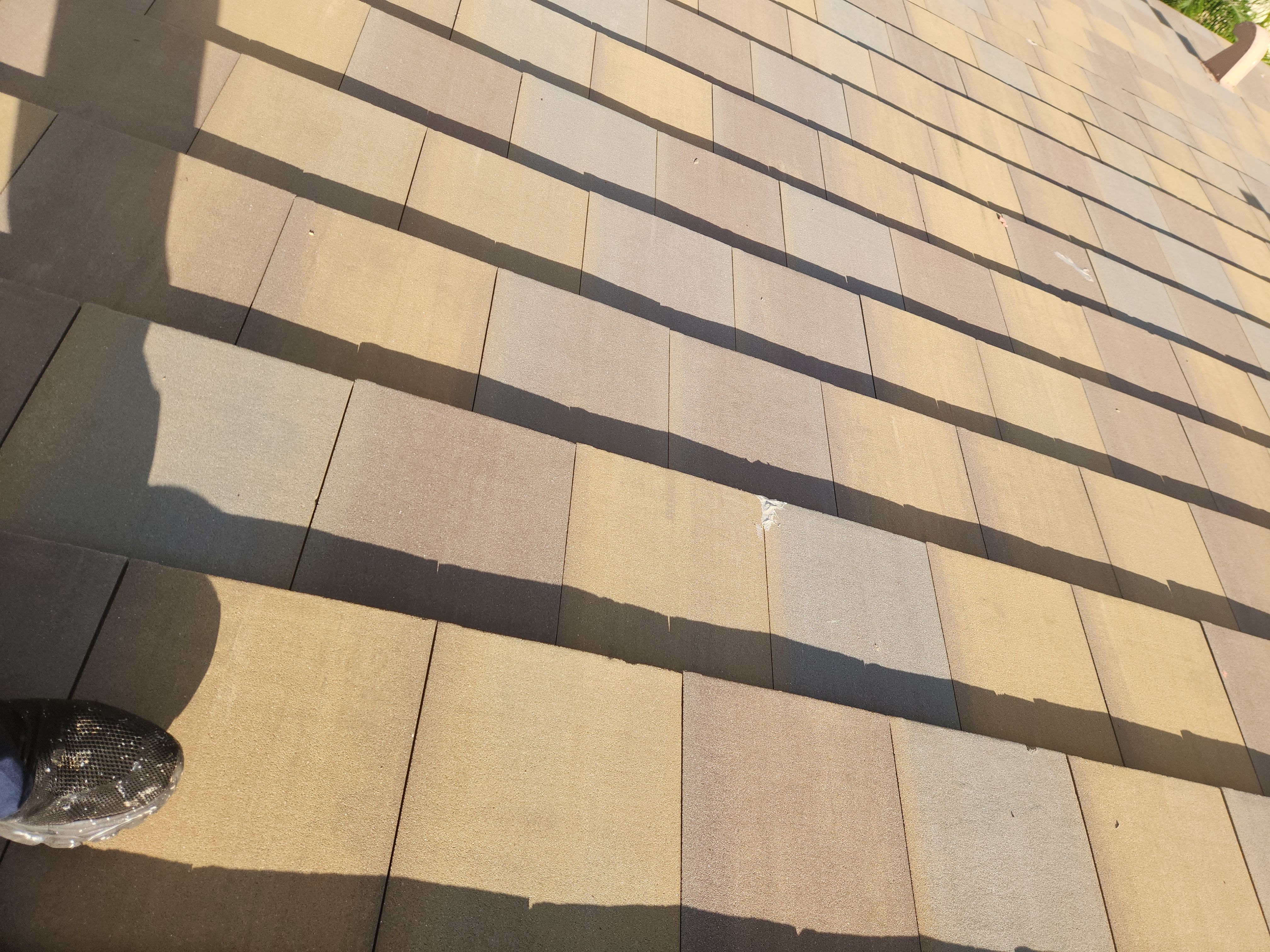 Concrete Tile Roof Repair for Residential Home in Wellington by Aastro Roofing