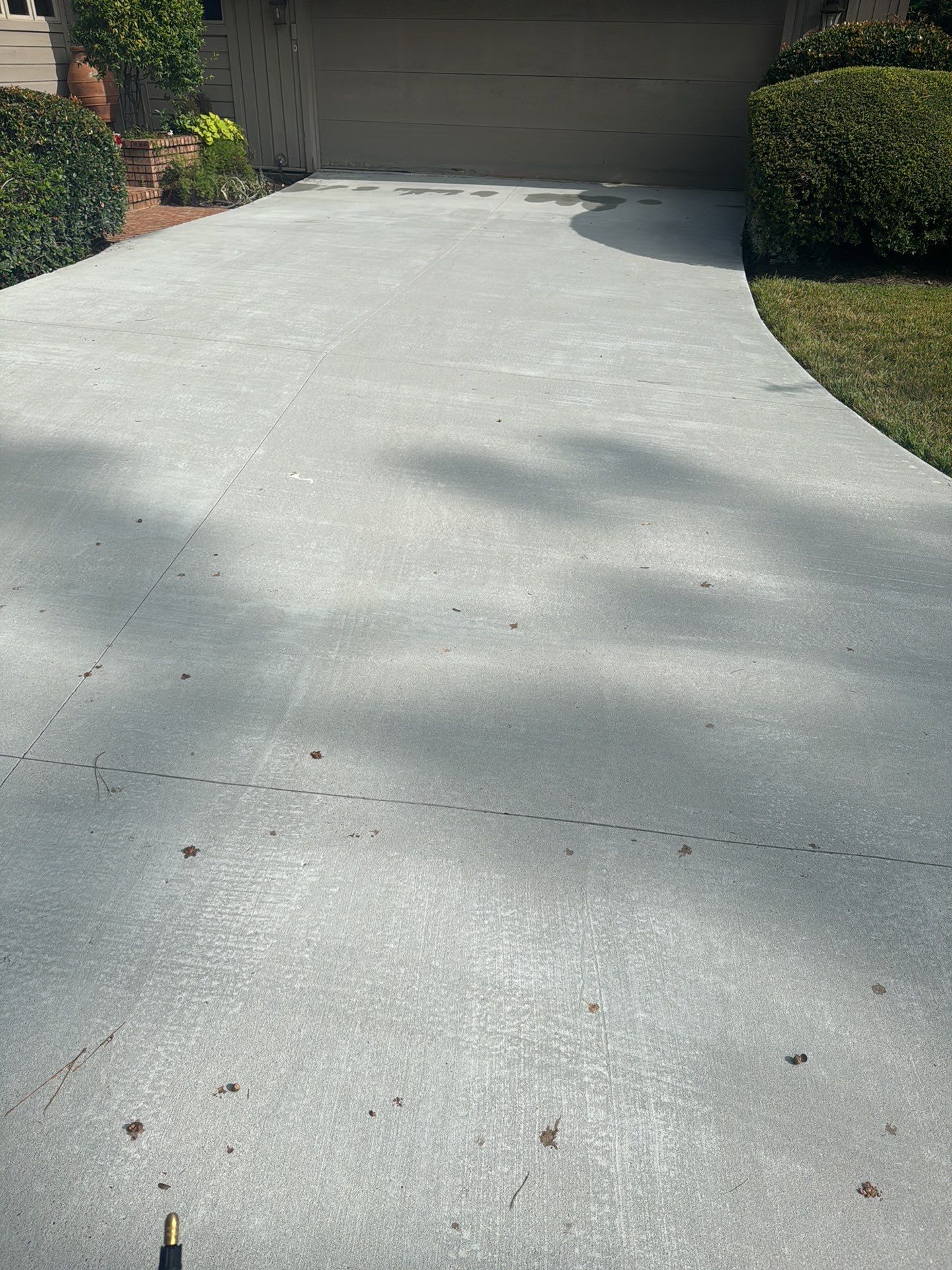 Concrete Driveway Replacement with Decorative Paver Inlay in Hilton Head Island by Lowcountry Scapes, LLC