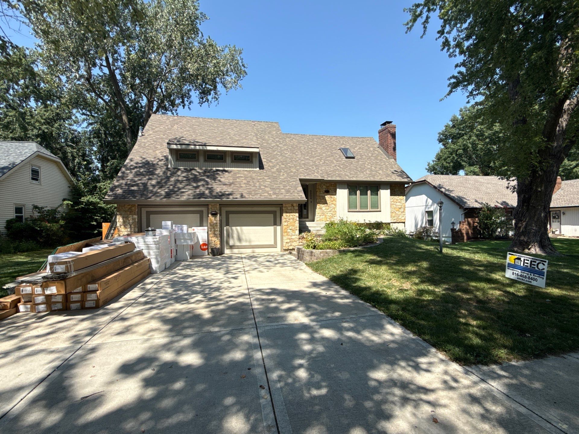 Comprehensive Kansas City Exterior Remodel Featuring Board And Batten Siding by EEC Windows, Siding & Roofing