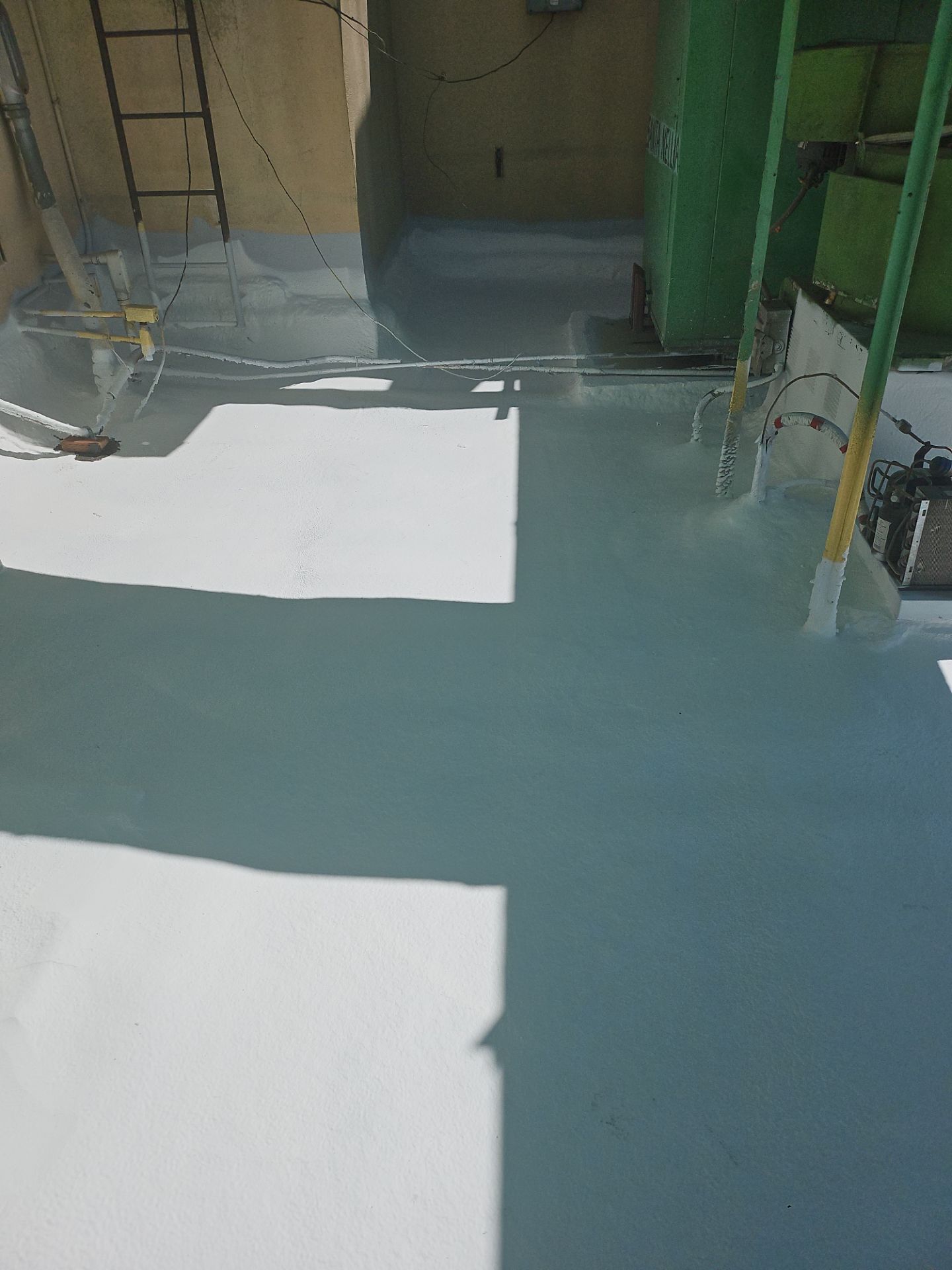 Spray foam and coatings using General Coatings acrylic coatings and spray foam by Straight Edge Roofing Inc