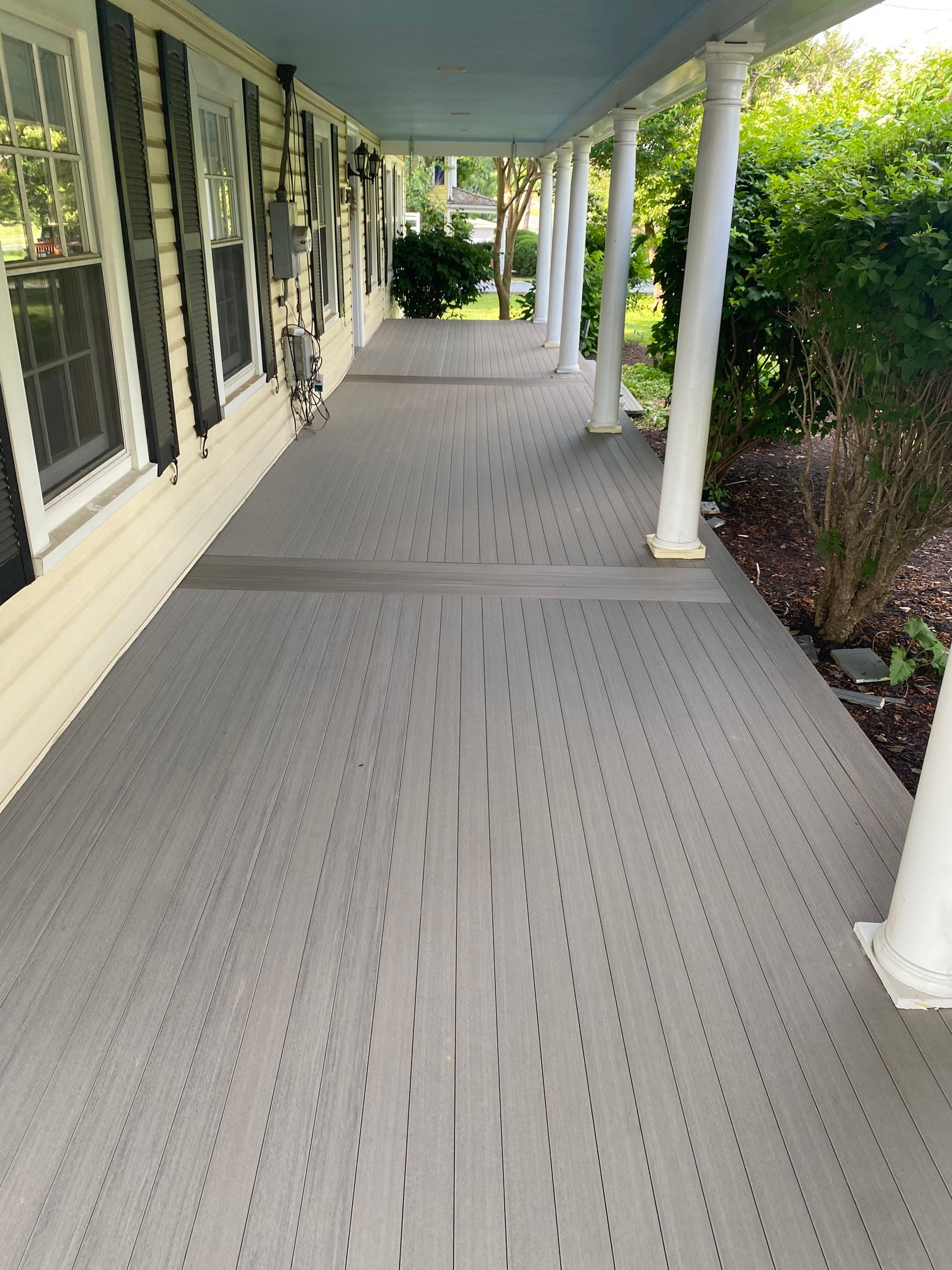 Front Porch Transformation using Timbertech Decking by The Smet Companies, LLC