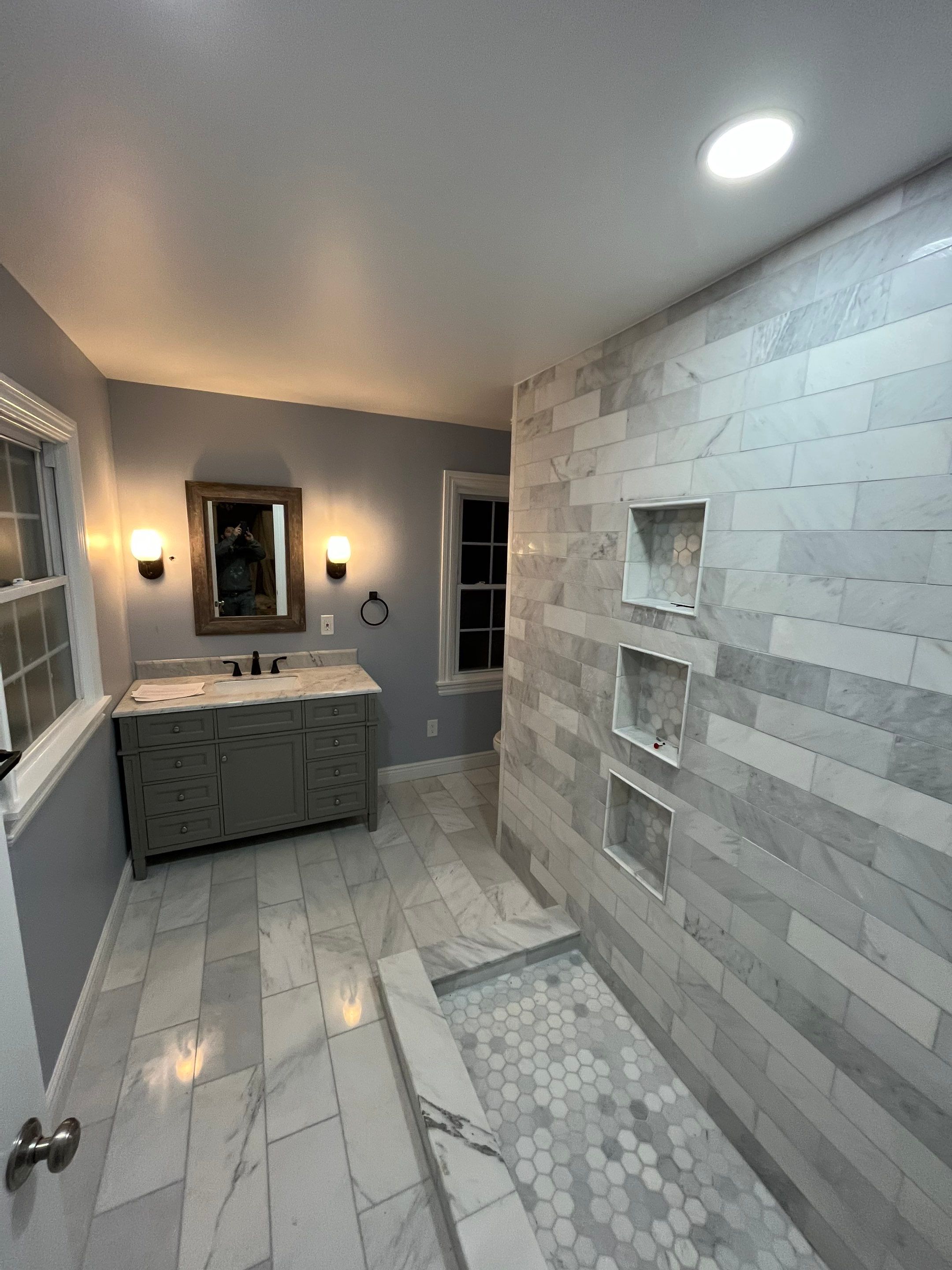 Bathroom Remodel using Tile by Home Concepts Construction