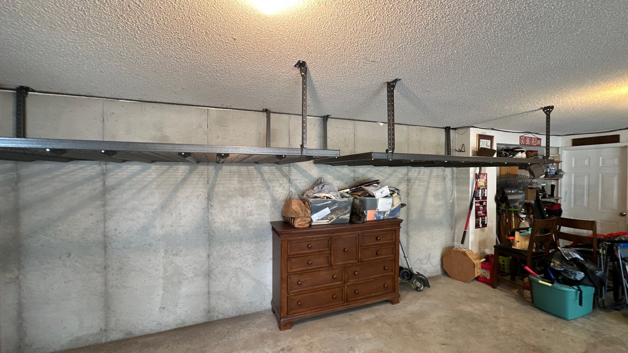 Mike F. added overhead racks to his garage  by Banner Garage