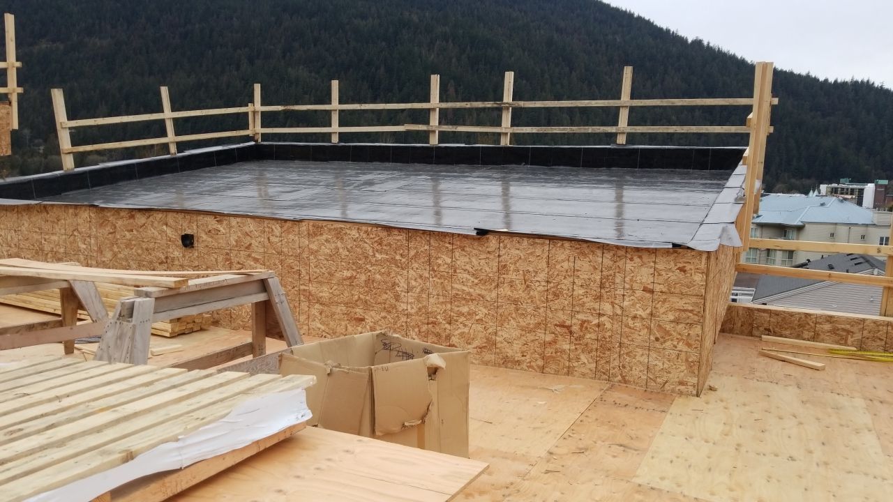 Commercial Roofing Installation using IKO 2ply sbs  by Top Notch Roofing Inc