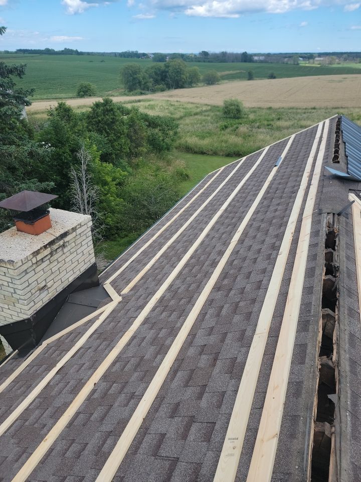  Metal Roof Installation on Residential Brick Home in Oostburg, WI by Gellings Roofing & Siding
