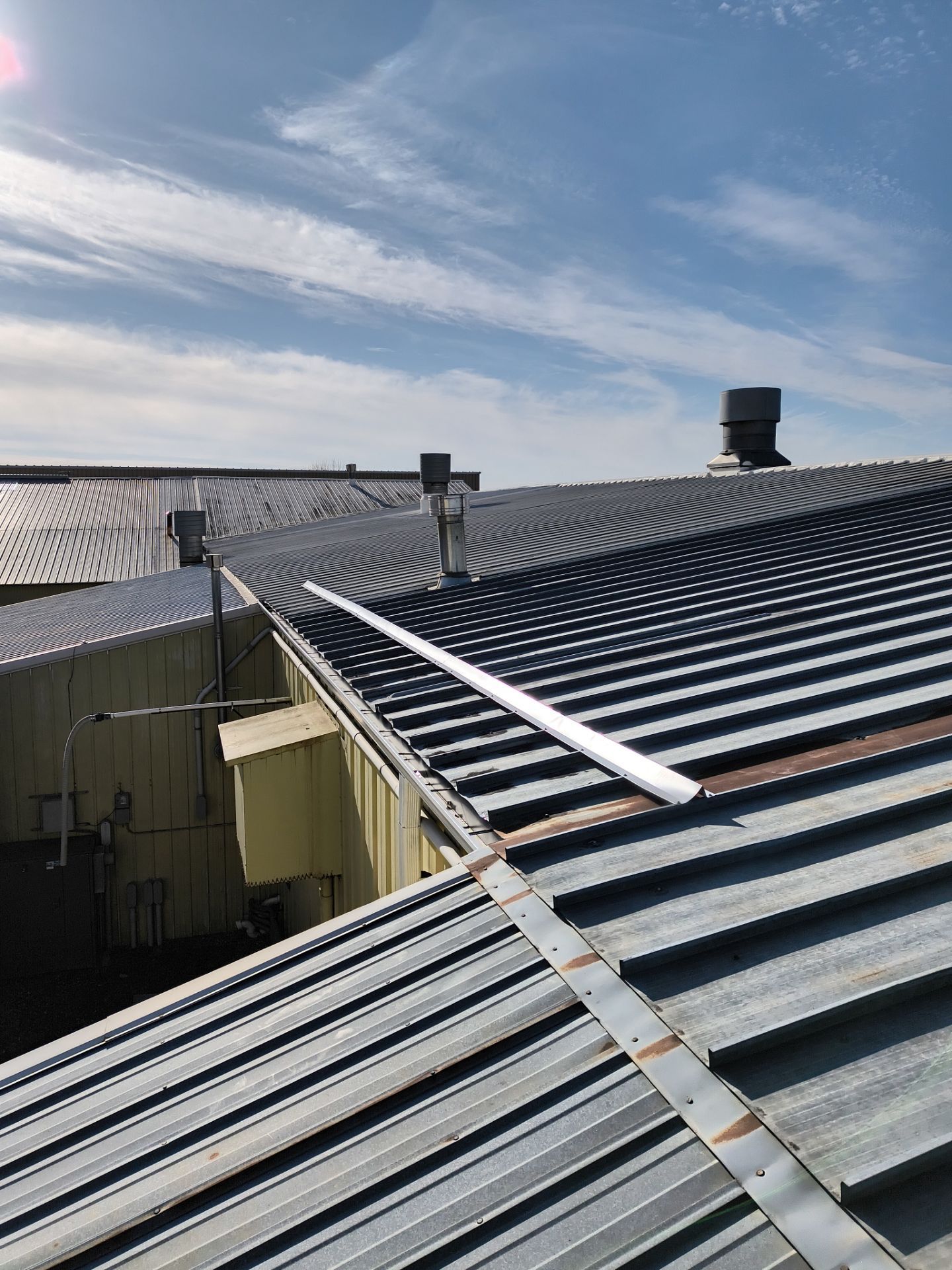 Commercial Gutter & Snow Guard Installation at Towmaster by Next Level Seamless Gutters / Exteriors Inc.