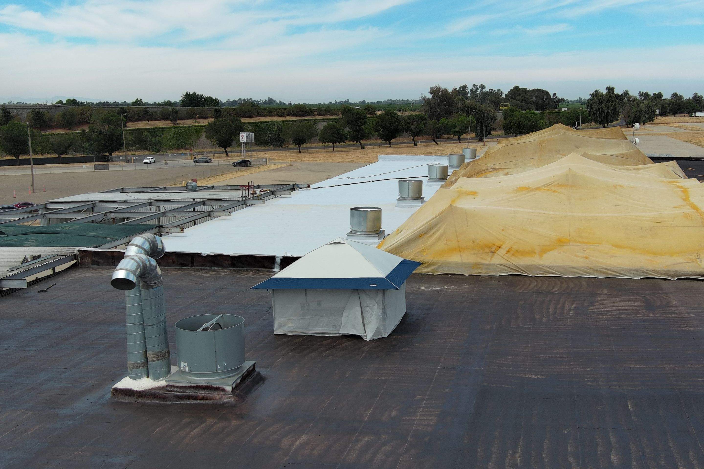 Pro Farms Spray foam roofing project by Straight Edge Roofing Inc