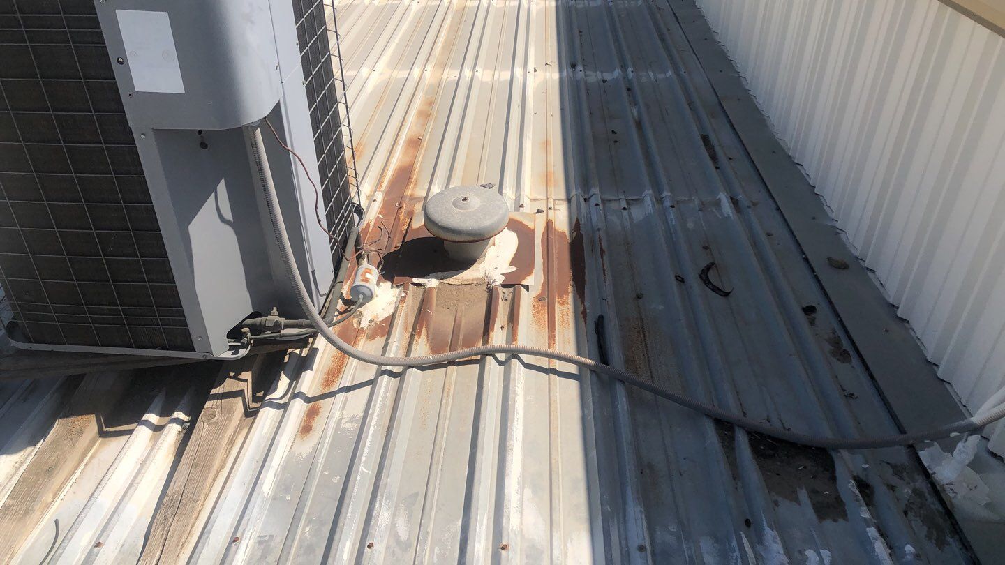 Metal Restoration Roofing system with Benchmark/PUMA XL 20 yr warranty by Straight Edge Roofing Inc