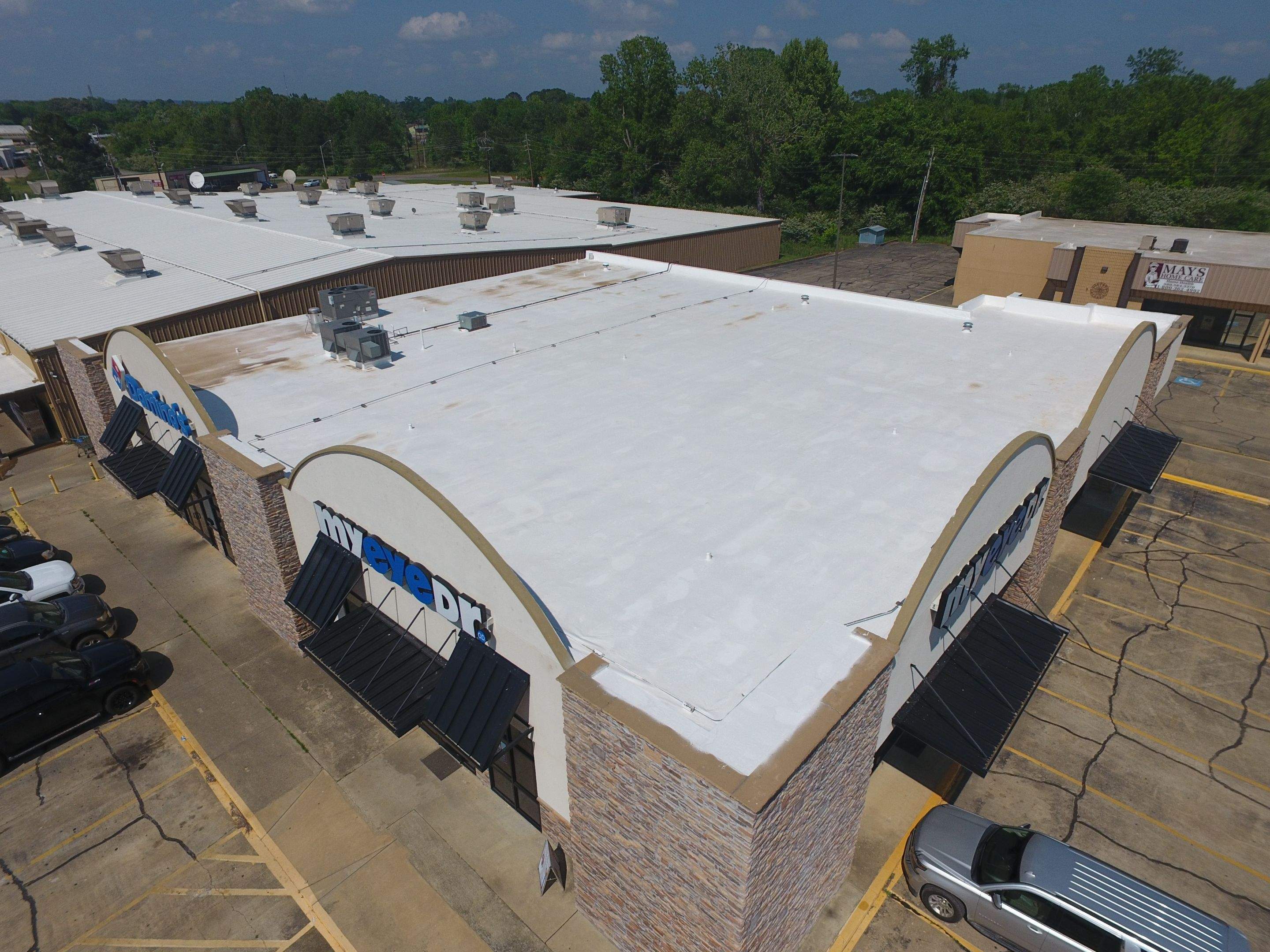 Commercial Roofing Installation using Aldocoat Coatings by Hostetler Roofing