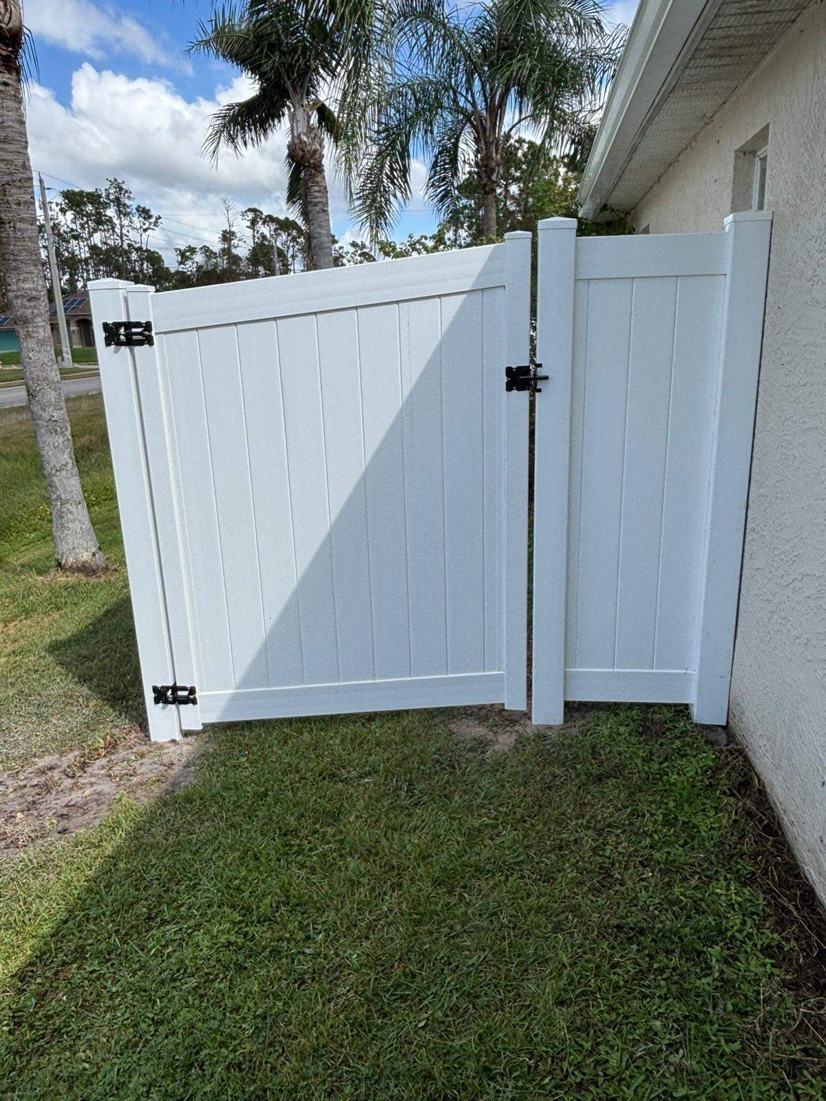 White Vinyl Privacy Fence and Gate Installation in North Port by True Fence LLC