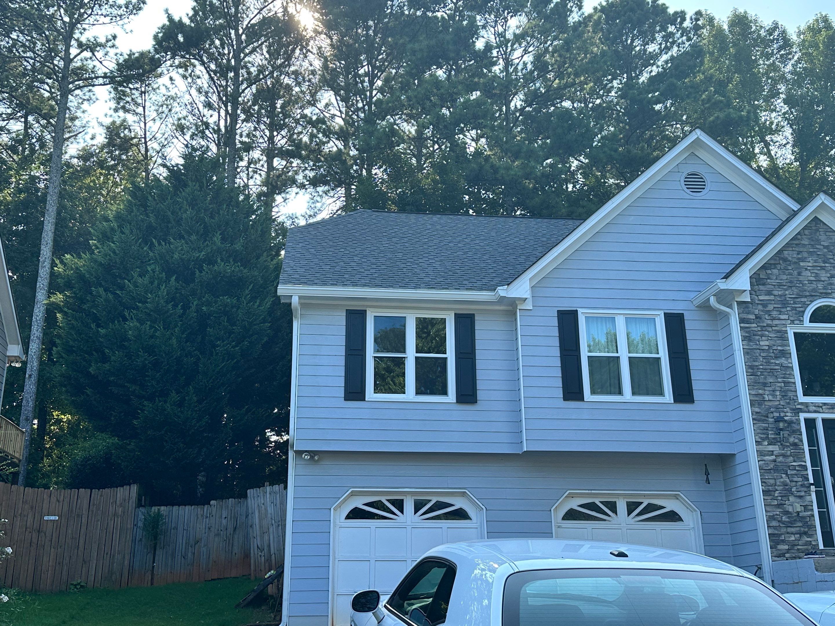 Gutter Replacement for a Two-Story Home in Woodstock by Swift Home Renovations