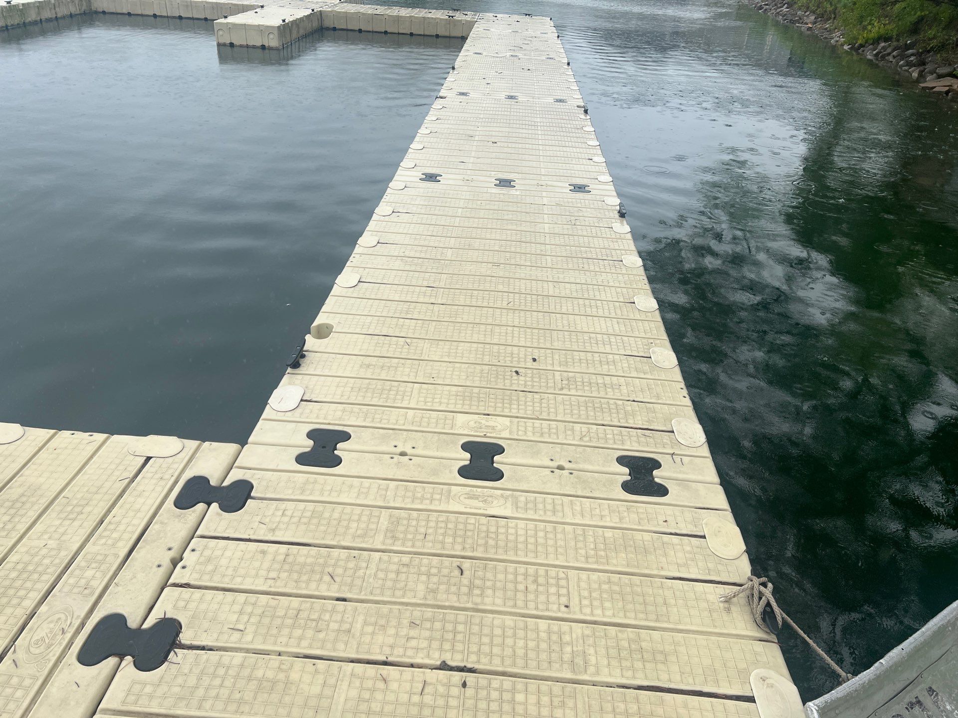 Power washing of floating dock by Northern Power Washing LLC.