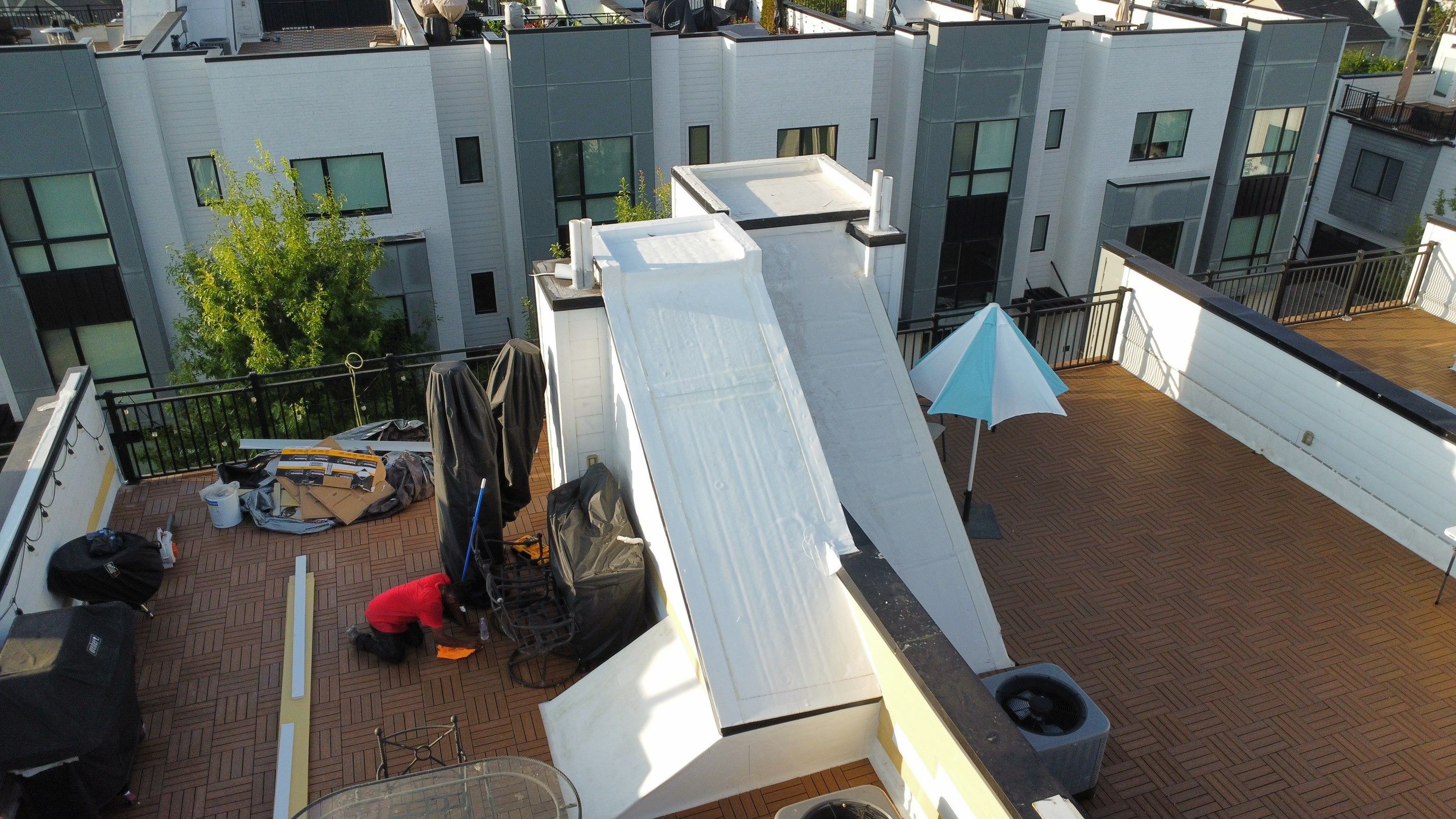 TPO Roofing System with Roof Deck Pavers by Undersun Roofing 