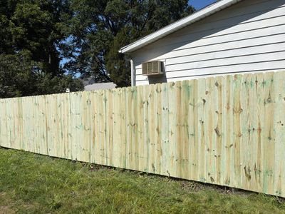 Pressure-Treated Wood Privacy Fence Installation in Waterloo