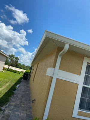 With 6-inch seamless gutters by Gutter Professor FL