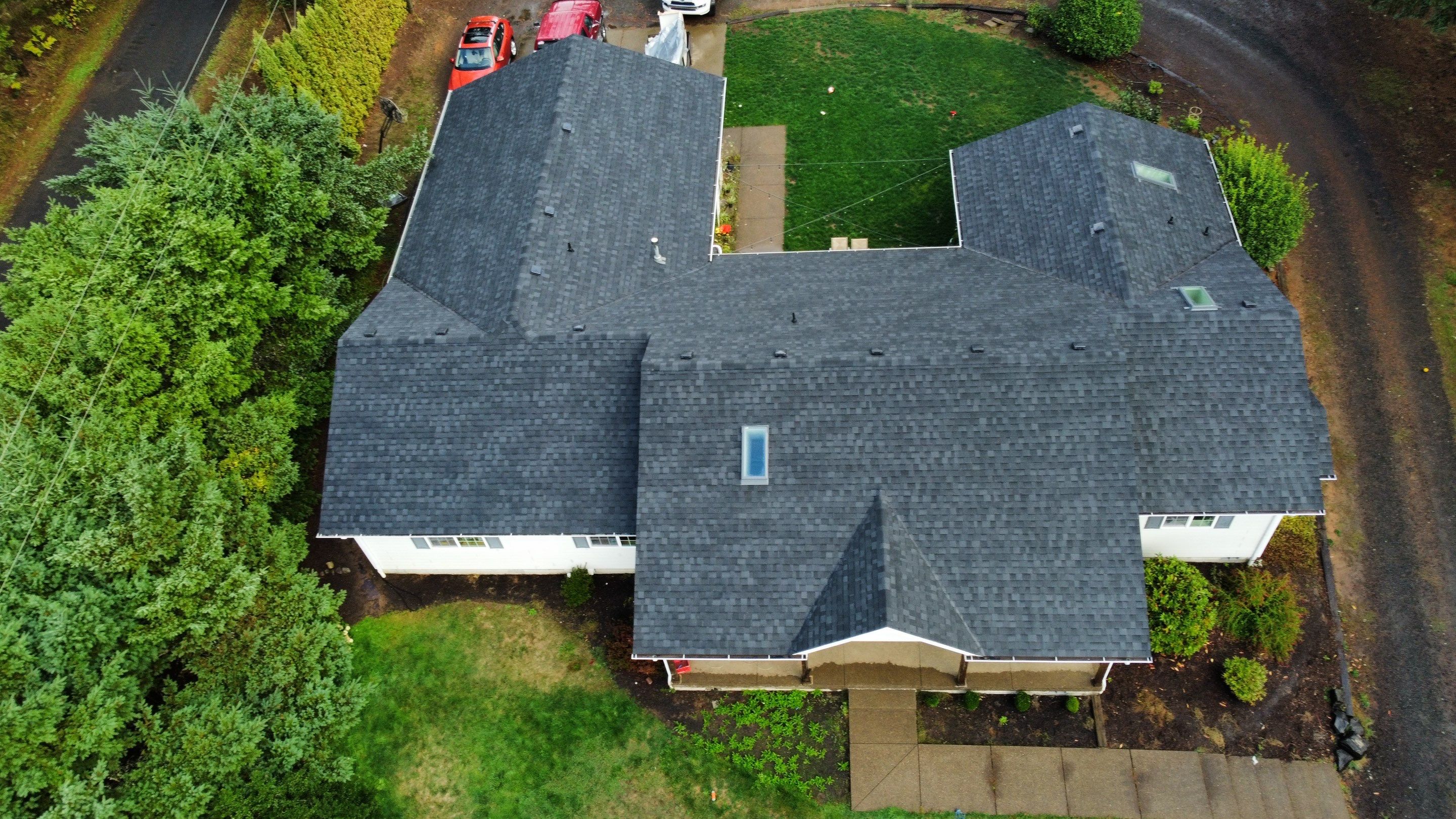 Residential Roofing Installation using IKO Dynasty (Color: Granite Black) by Orezona Building & Roofing Company, Inc.