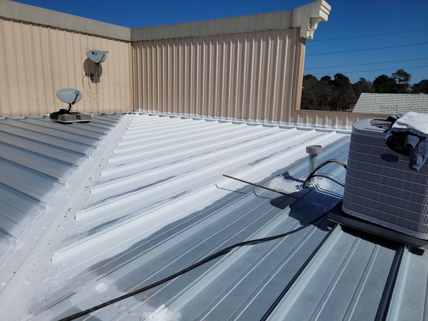 Commercial Metal Restoration System using Aldocoat Coatings by Hostetler Roofing