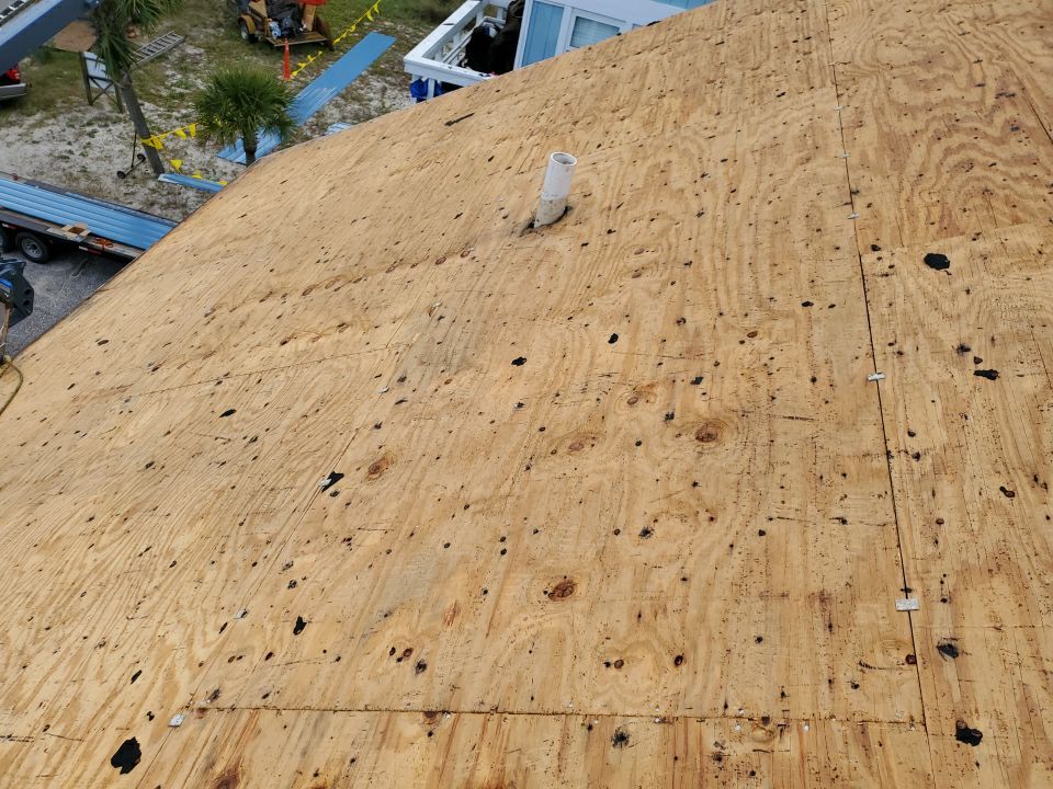 Commercial Roofing Installation using Metal roofing by American Roofing & Construction LLC