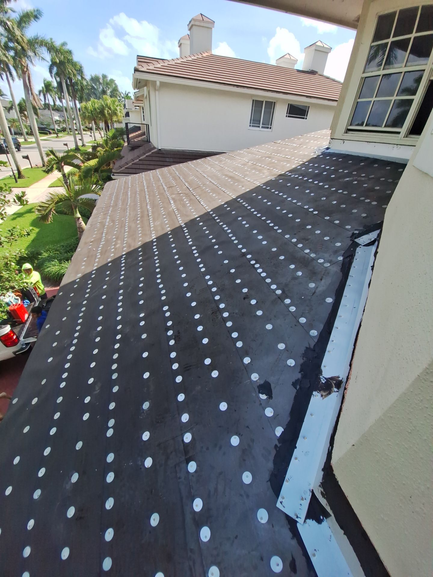 Residential Roofing Installation using 1" Nail strip metal roof by BLUES BROTHERS ROOFING