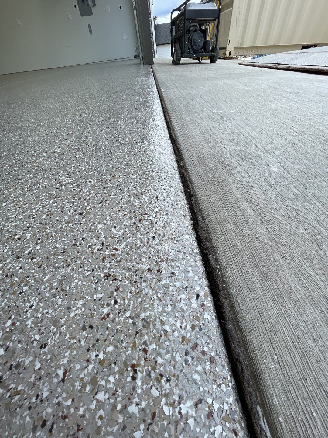 Garage Transformation using Pebble Beach by Croc Coatings, LLC