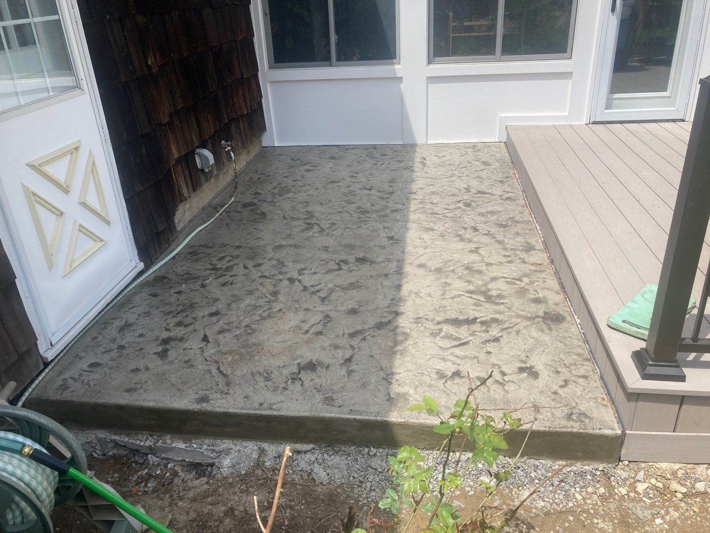 Deck and Stamped Concrete by Ivy Lea Construction
