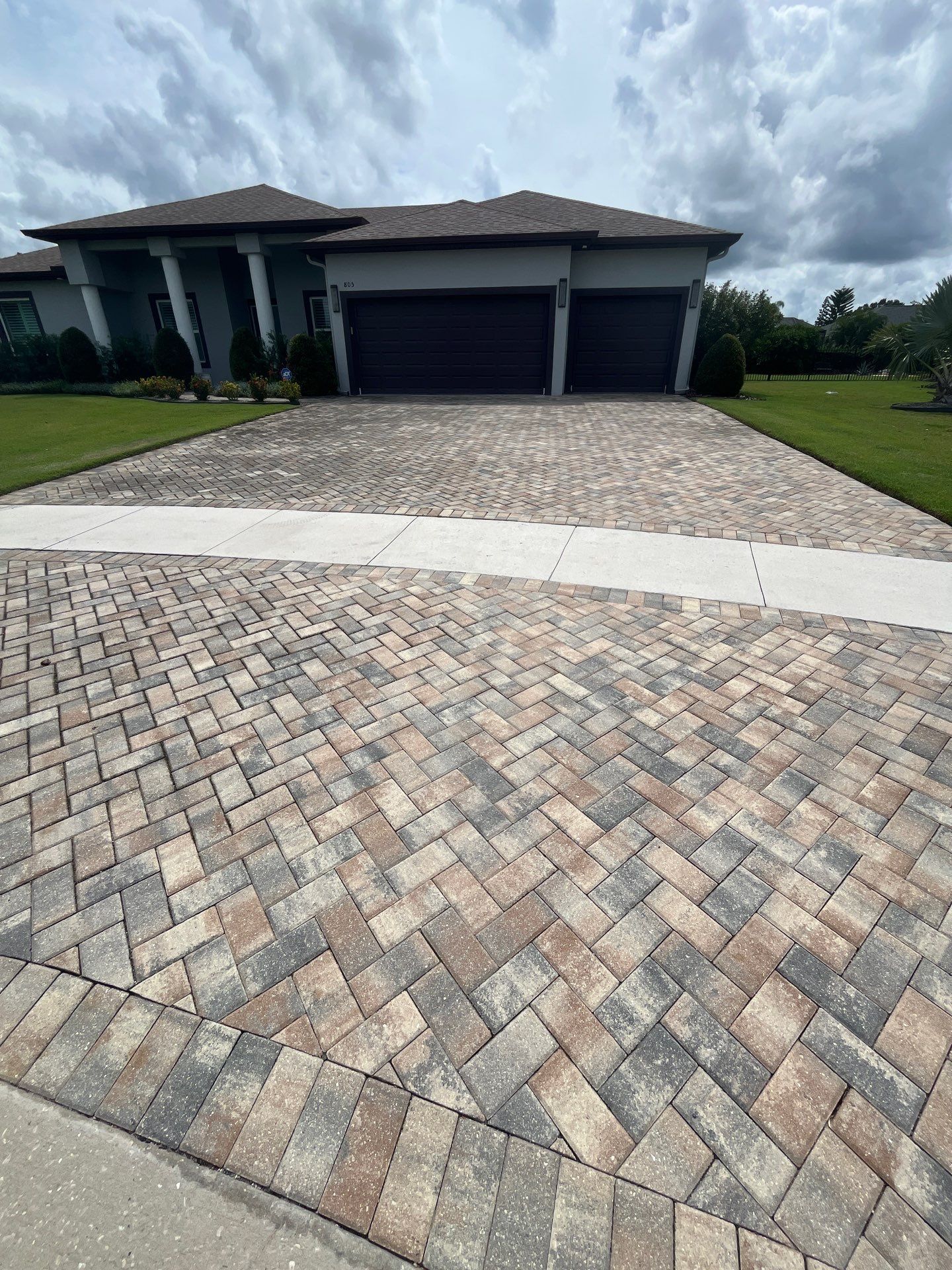 Residential Paver Sealing for Driveway and Pool Deck in La Paloma Sun City Center by Supreme Paver Experts