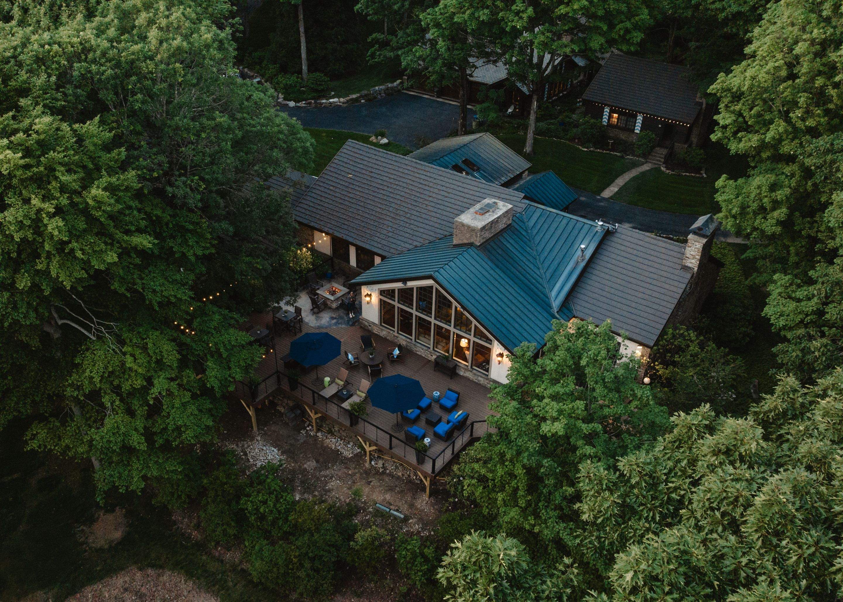 1500 sq/ft Composite Deck Build with Outdoor Kitchen in Champion by Cousins Roofing Siding & Decks