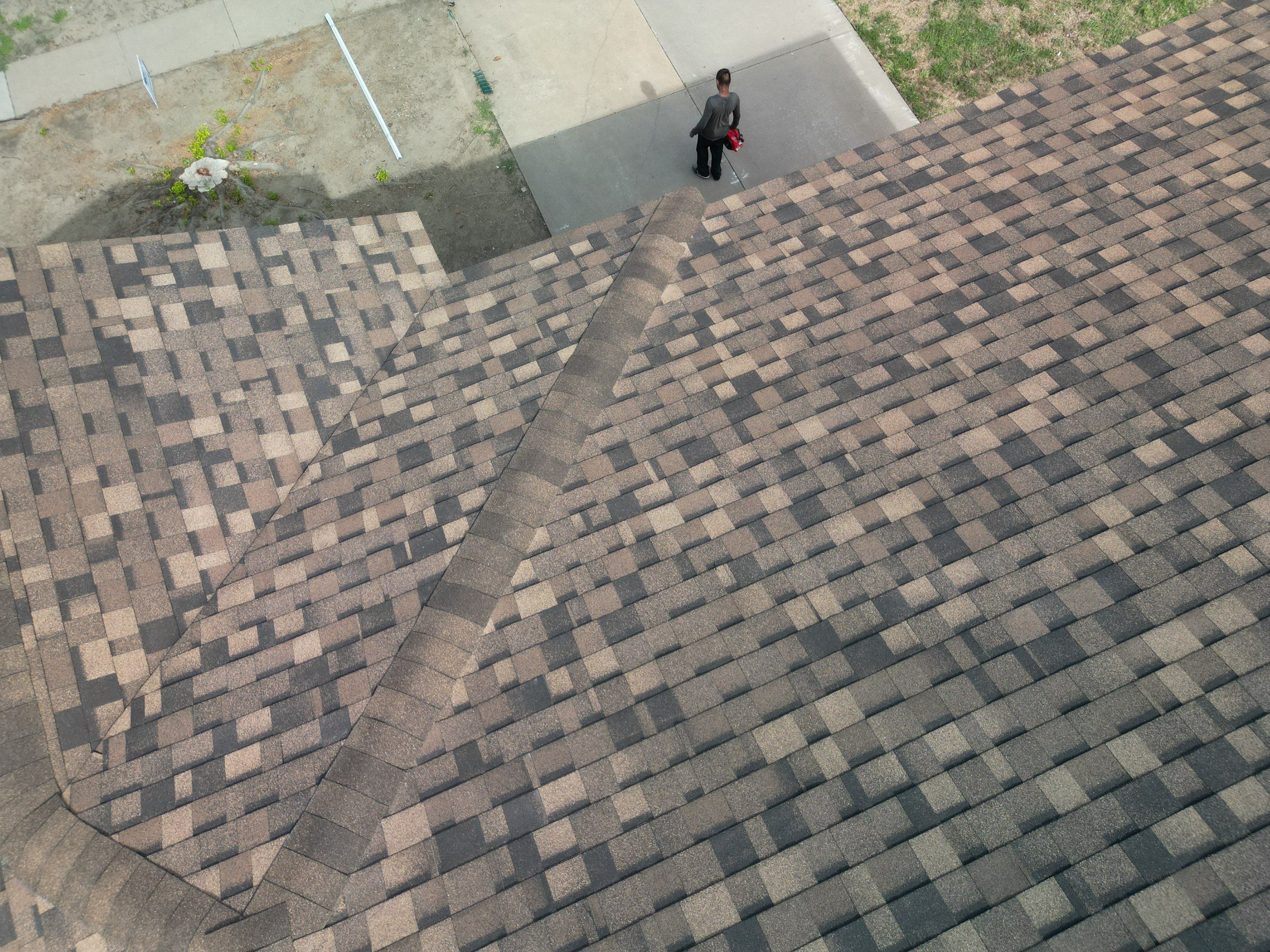 Full Roof Replacement, Chimney Rebuild and Interior Damage Replacement by First United Roofing & Construction