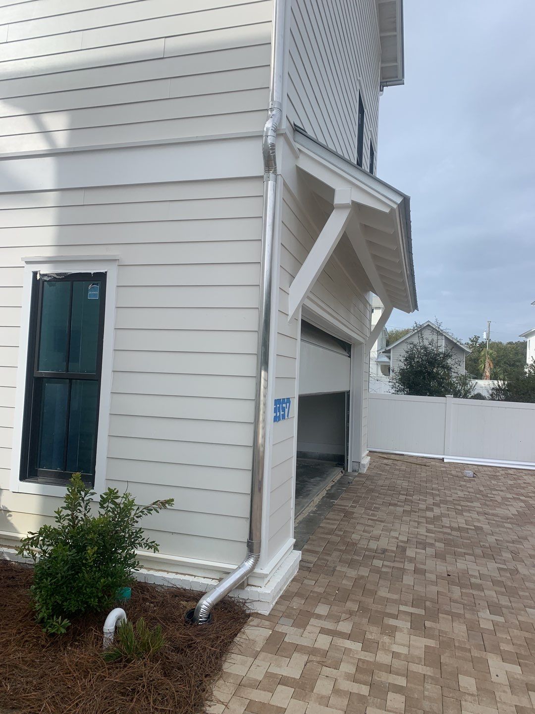 Half-Round Gutters in Galvalume Color in Santa Rosa Beach FL by Gutter Professors