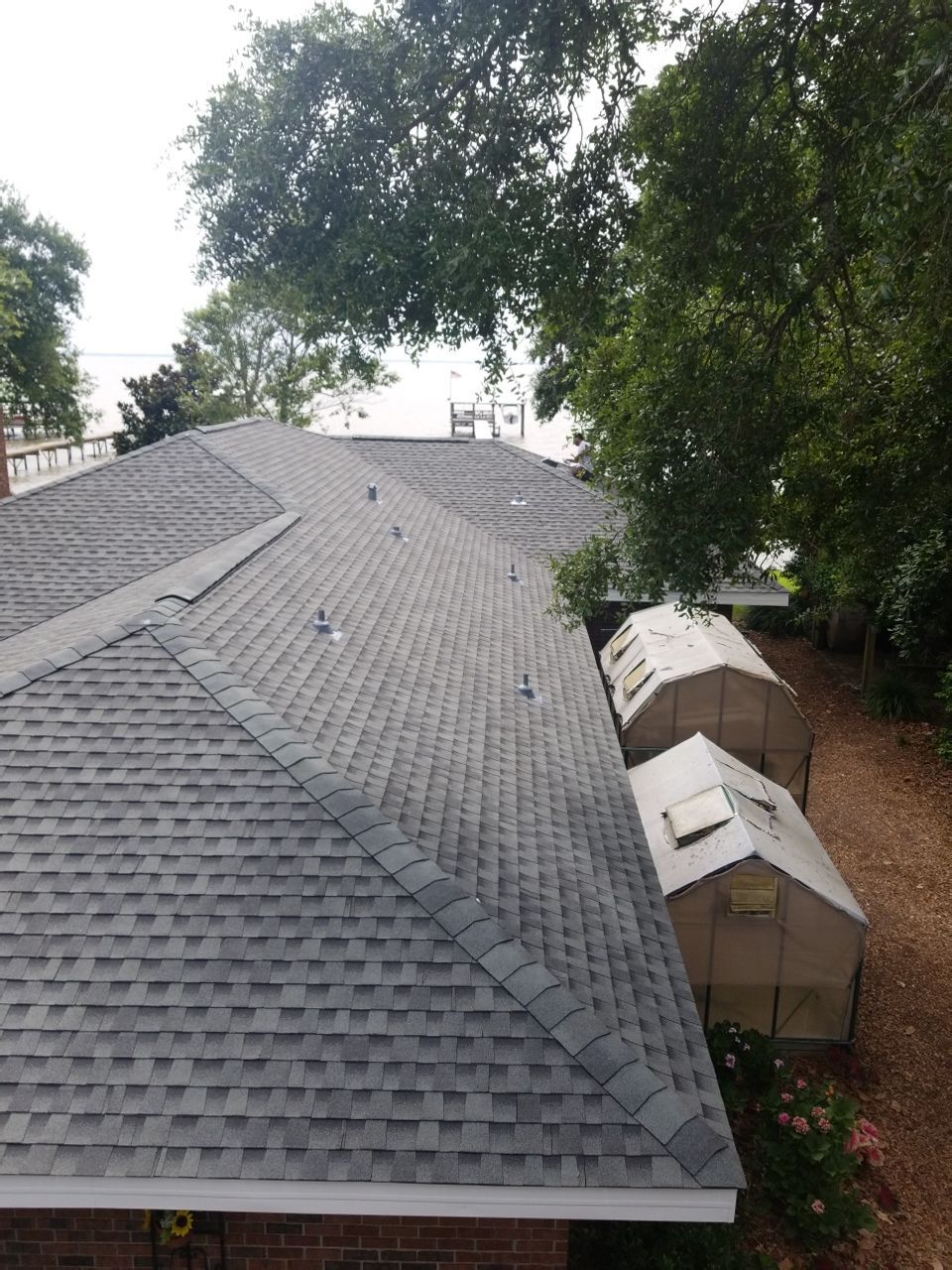 Residential Roofing Installation using Roof Replacement by American Roofing & Construction LLC