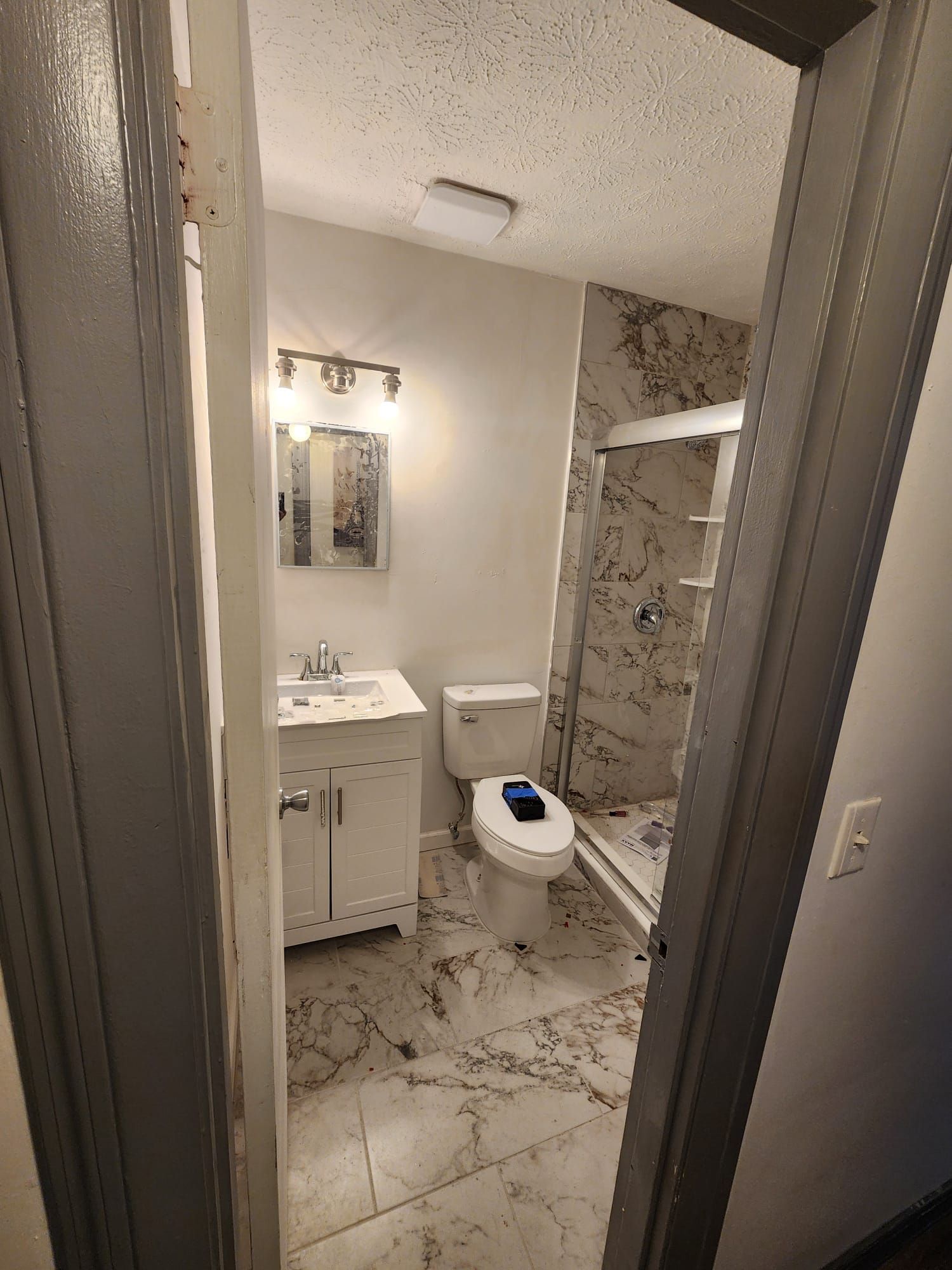 Dual Bathroom Makeover by urban green energy llc