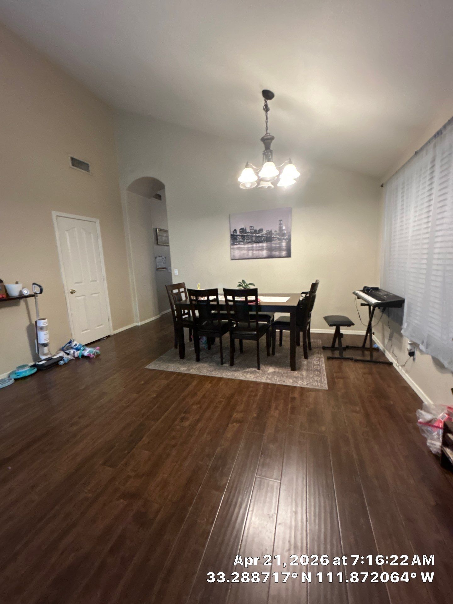 Dark Wood-Look Laminate Flooring Installation in Chandler Dining Room by CompanyCam Sales Demo