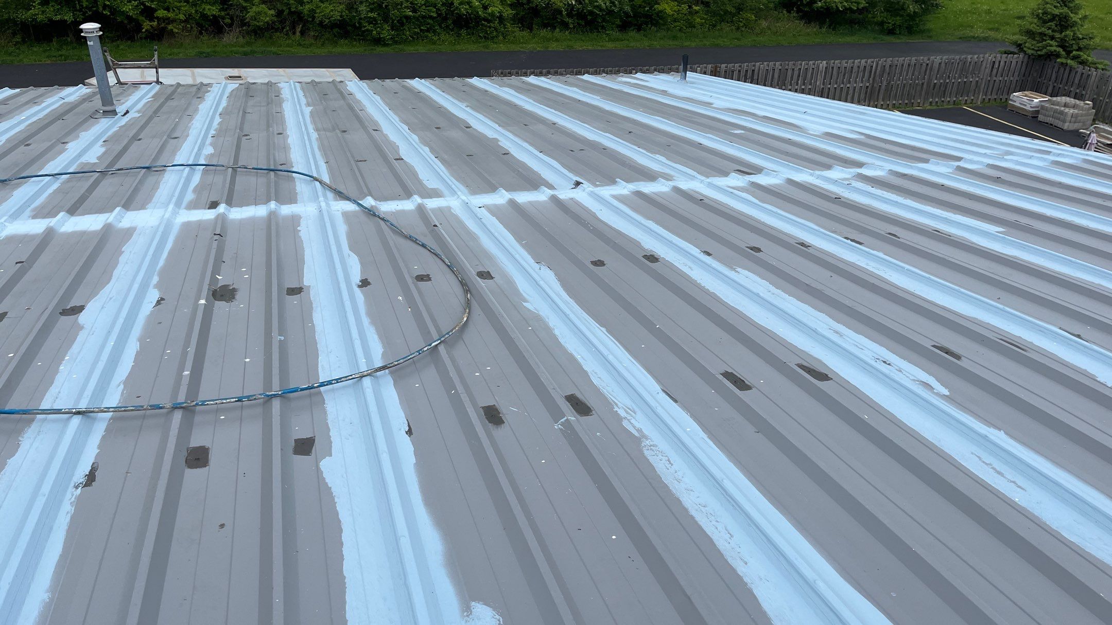 Berea Ohio Metal Roof Coating by Gold Star Roofing LLC 