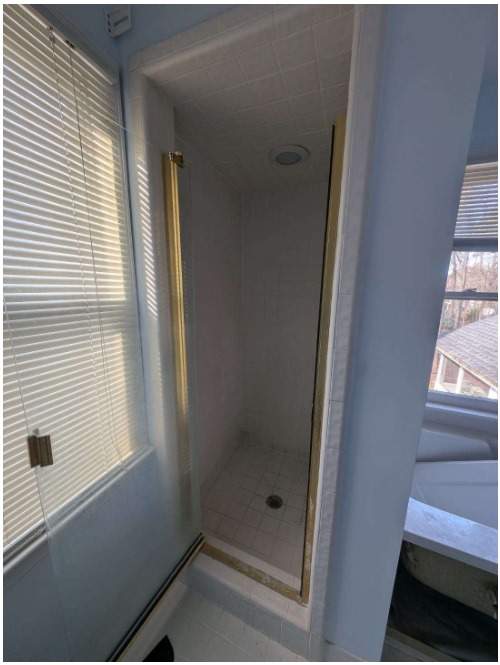 From Cramped & Carpeted to Bright & Modern: A Cary Bathroom Transformation by Elite Remodeling and Design LLC