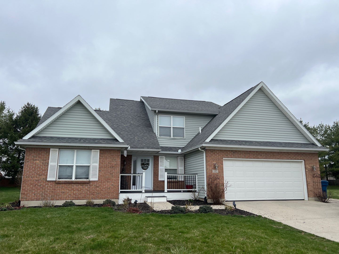 Exterior Installation using Onyx Black Durations and White Siding by WIW Enterprises Inc