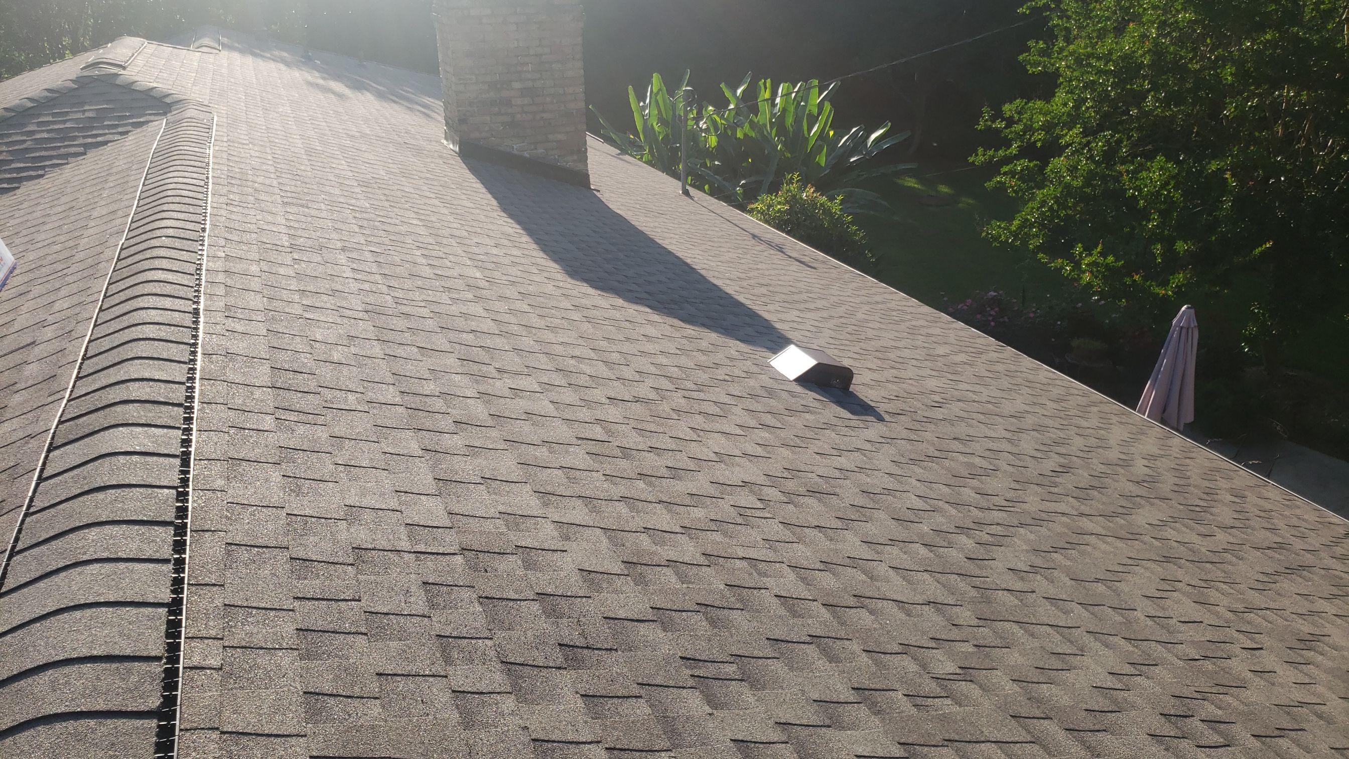 Residential Roofing Installation using Roof Replacement by American Roofing & Construction LLC