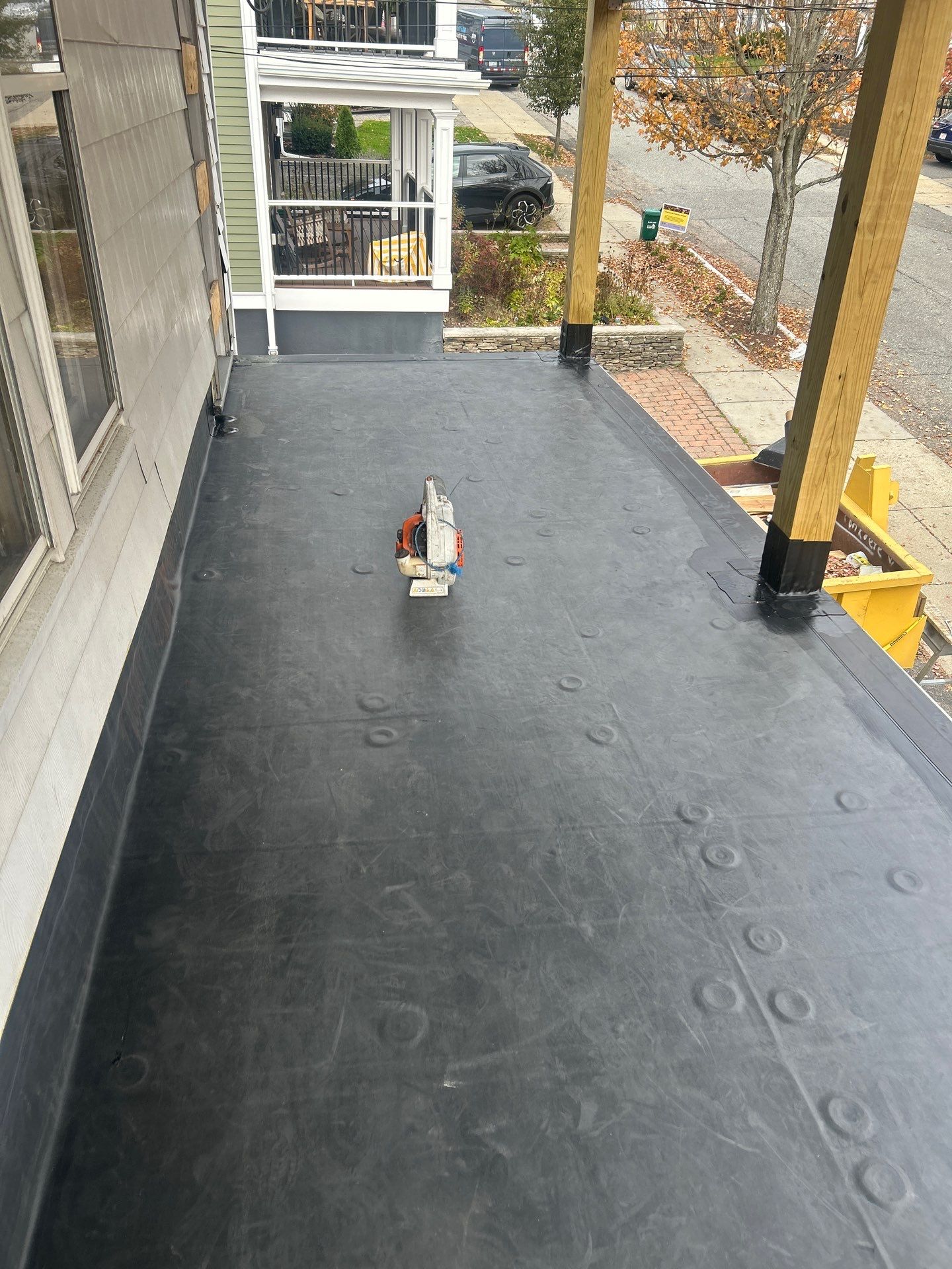 Watertown Porch EPDM Rubber Roof Installation by Mighty Dog Roofing of Greater Middlesex County
