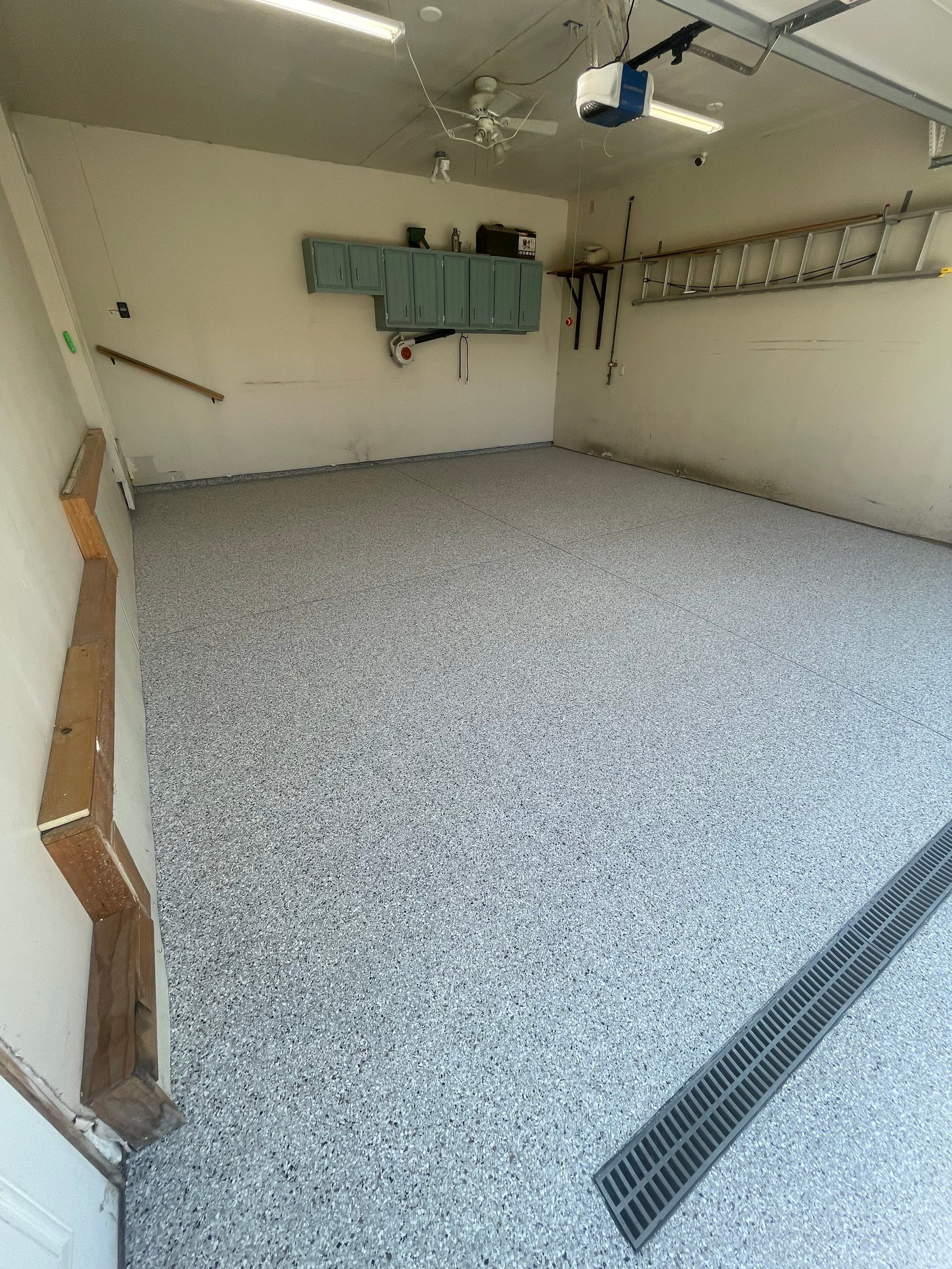 Multi-Stall Garage Floor Coating Installation in Sioux Falls by Select Painting, Coatings & Garage Cabinets