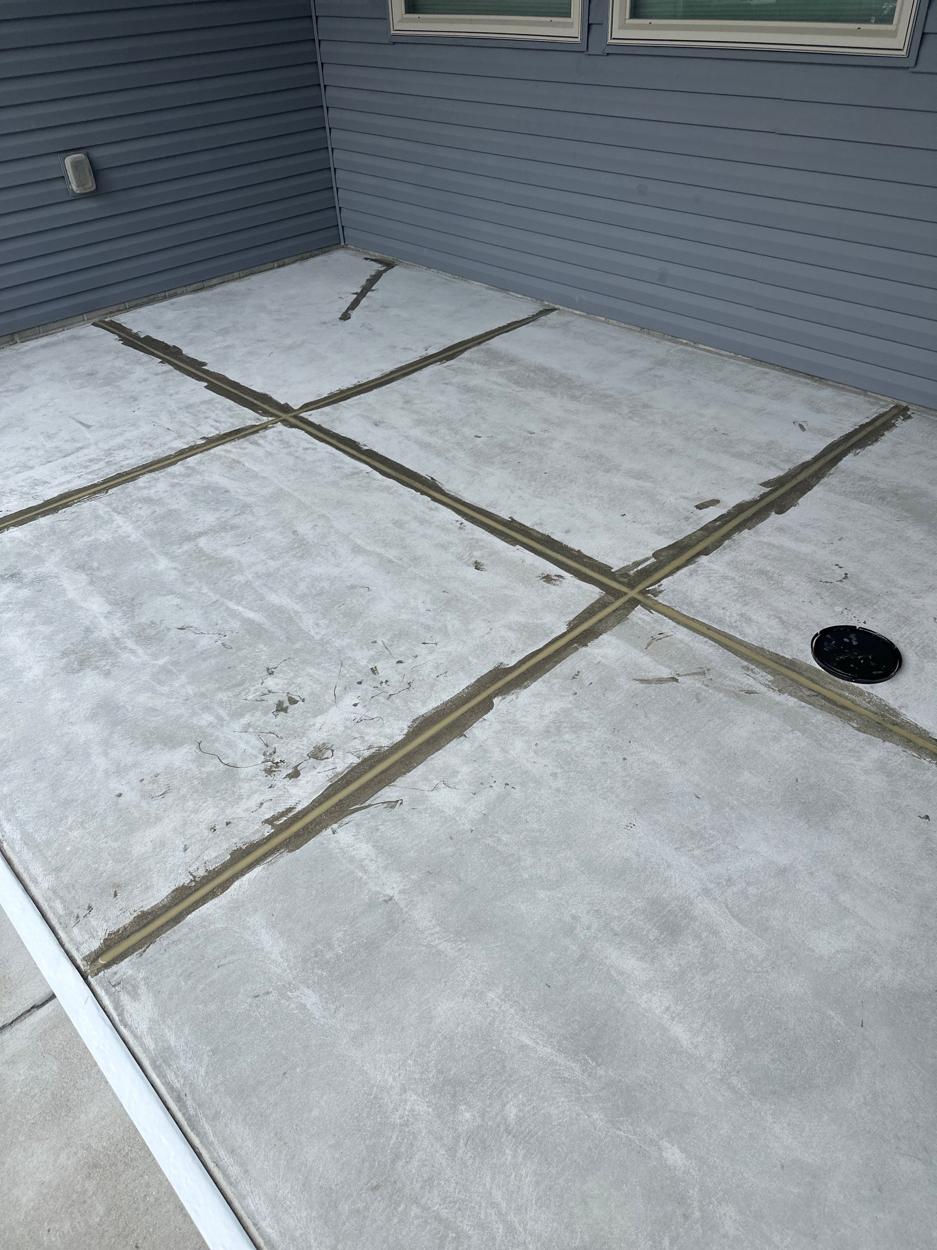 Back Patio Transformation: A Better Space for Grilling in Lincoln, Nebraska by Goat Coatings