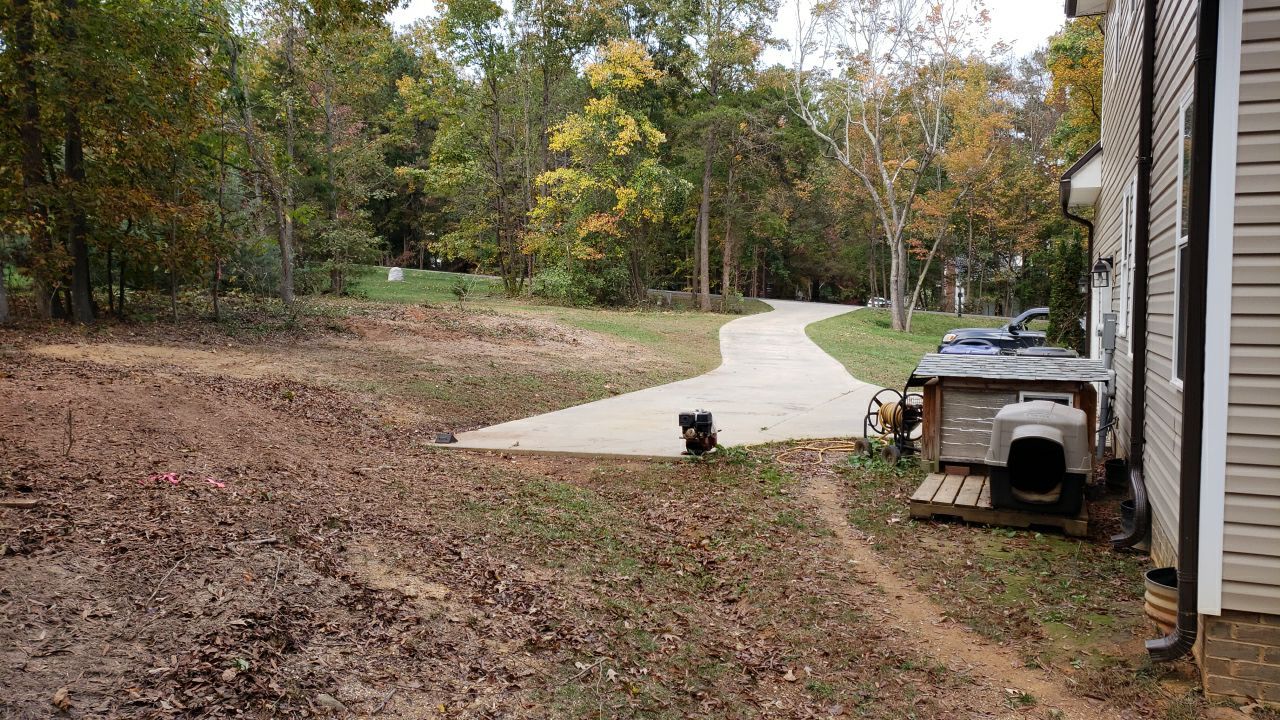 land clearing using machinery by Power Wash Masters LLC