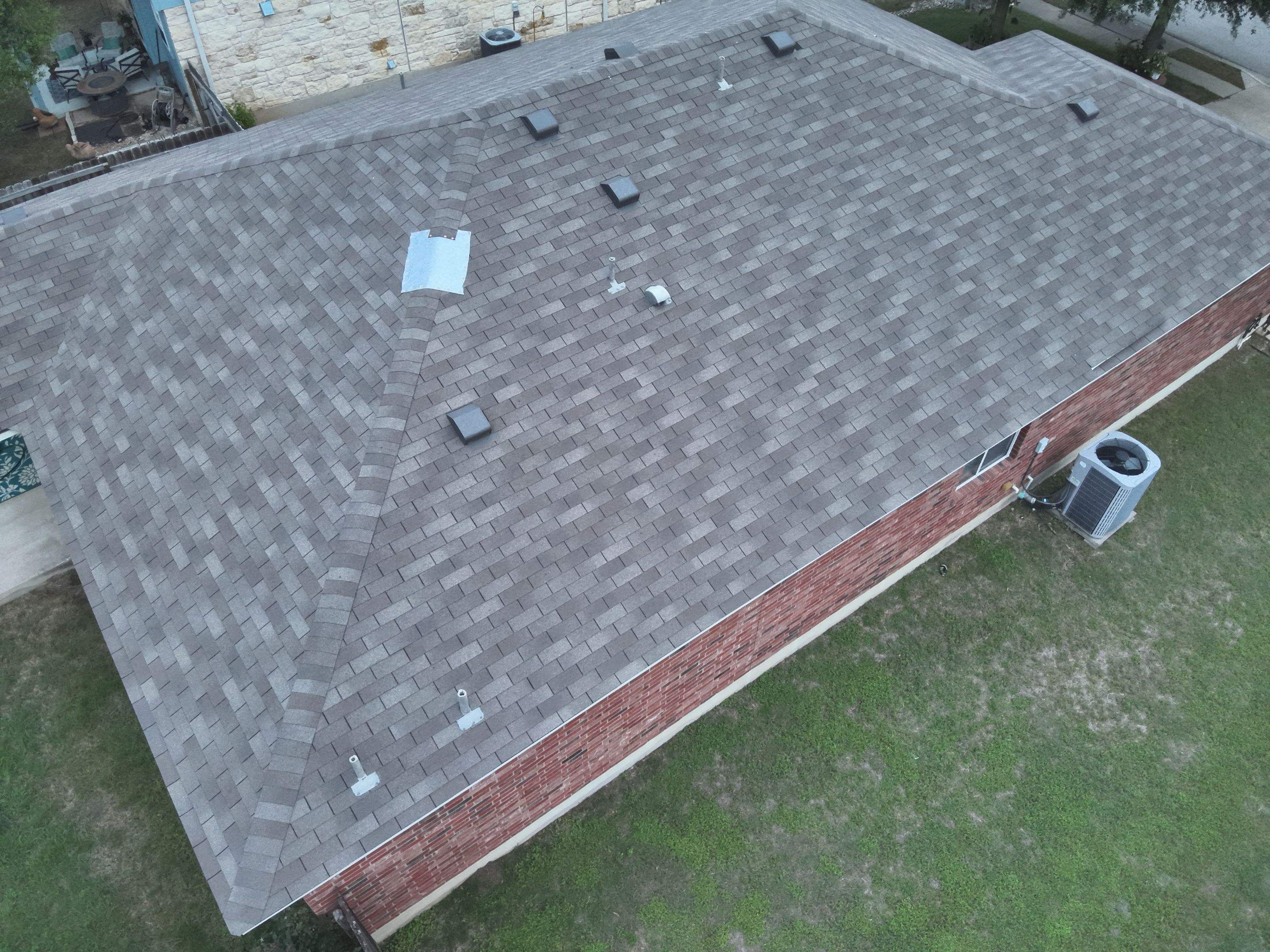 Residential Roof Replacement and Storm Damage Restoration in Leander by Caliber Restoration LLC