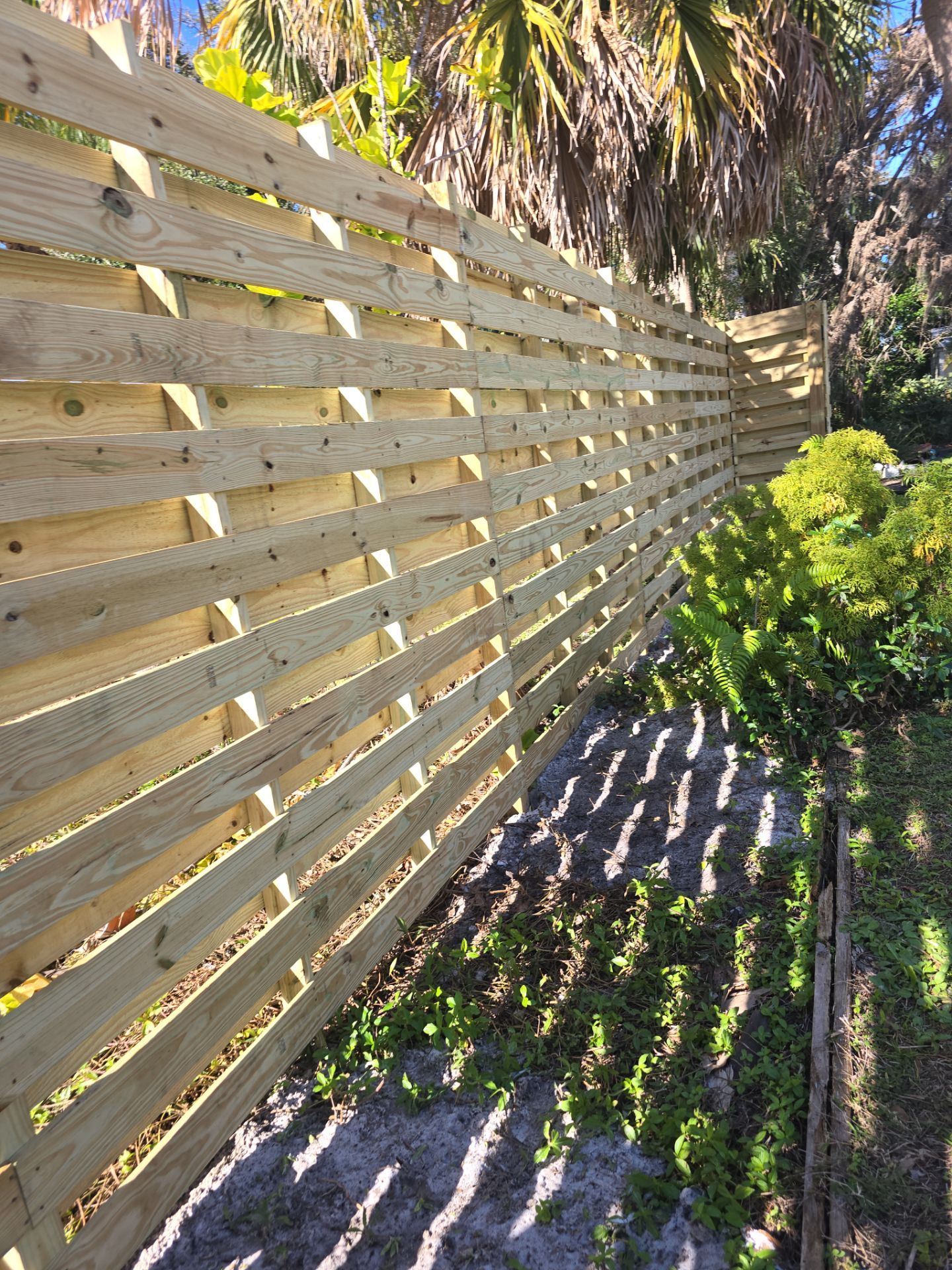 8'H Stained Shadowbox Wood in Nokomis by True Fence LLC