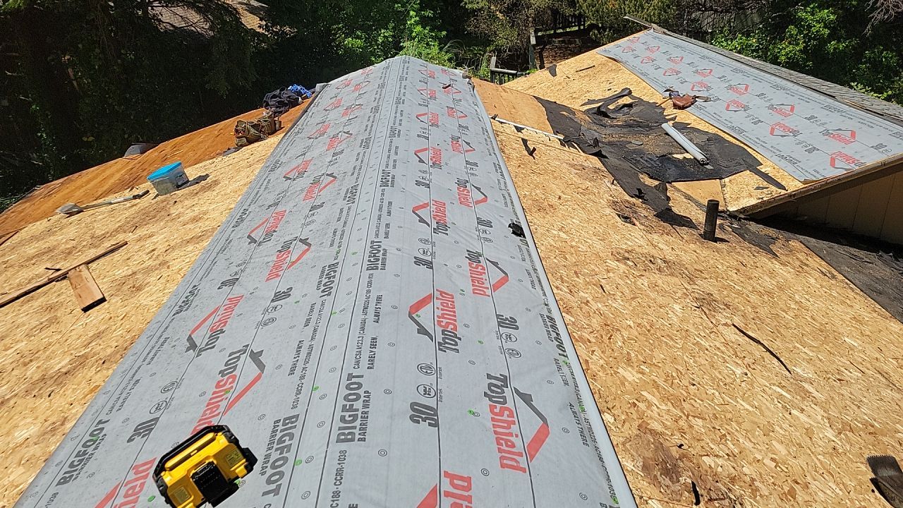 Residential Roofing Installation using Malarkey Highlander with GAF 60mil TPO by Orezona Building & Roofing Company, Inc.
