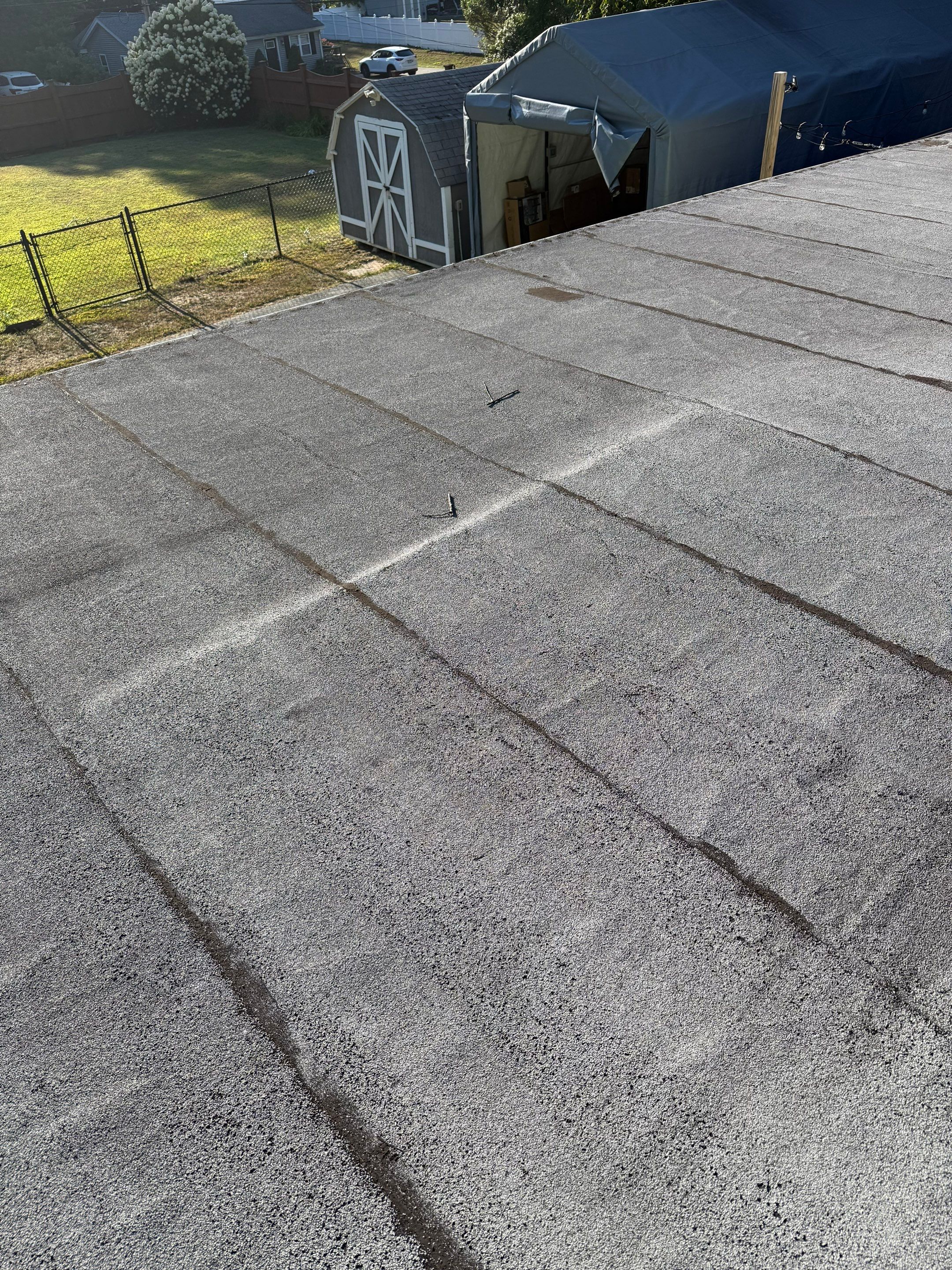 Westford EPDM Flat Roof with Gutter & Soffit/Fascia Replacement by Mighty Dog Roofing of Greater Middlesex County