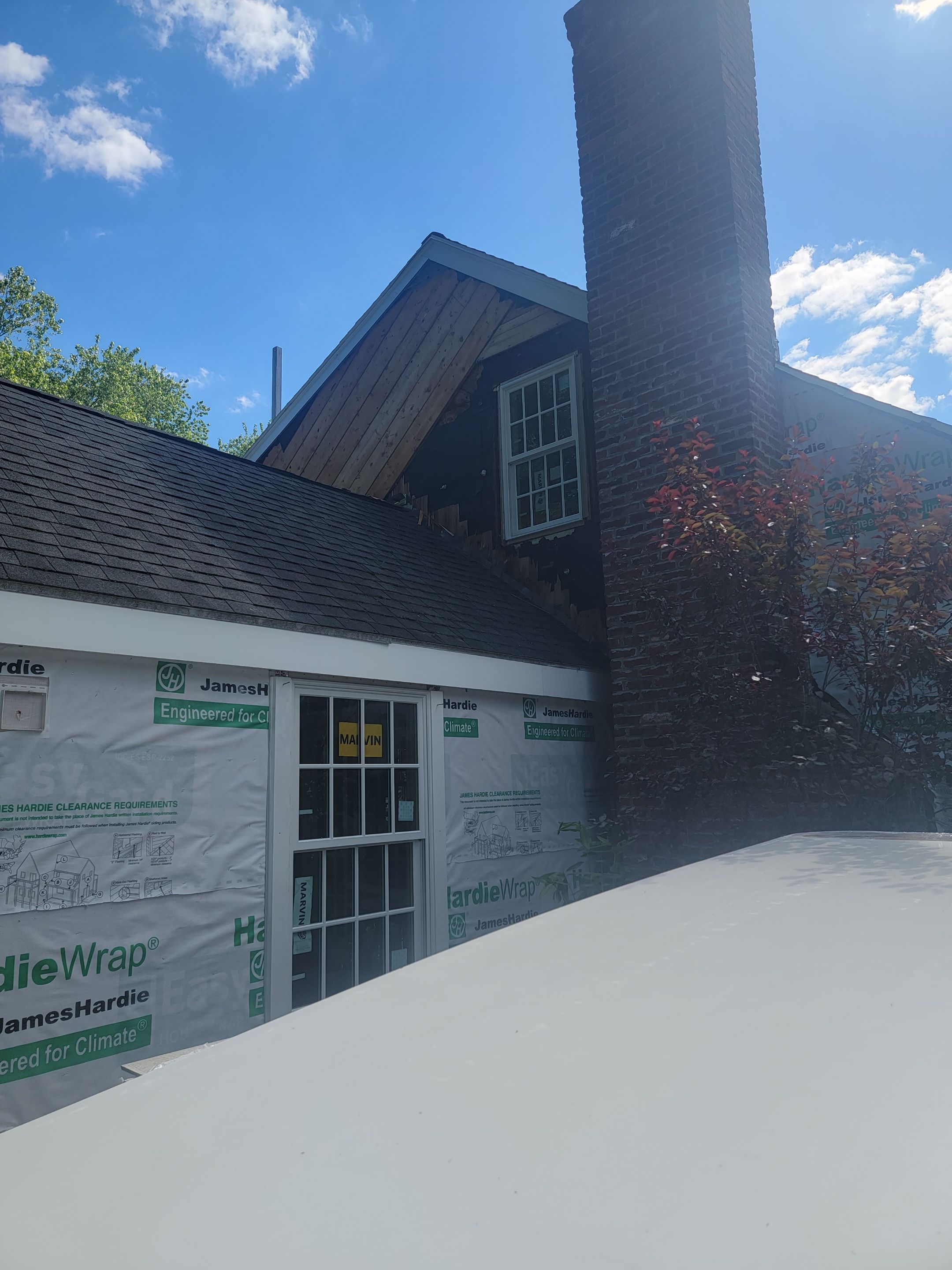 Siding Installation using James Hardie. New ThermaTru entry door and Marvin windows by UBrothers Construction