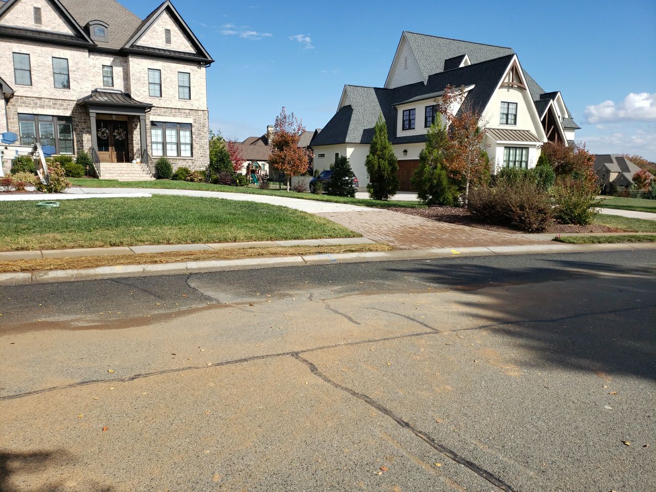 Driveway Clean using cleaner by Power Wash Masters LLC