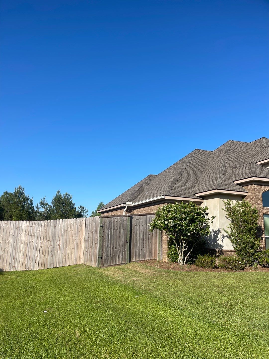 Residential Roofing Installation using Roof Replacement by American Roofing & Construction LLC