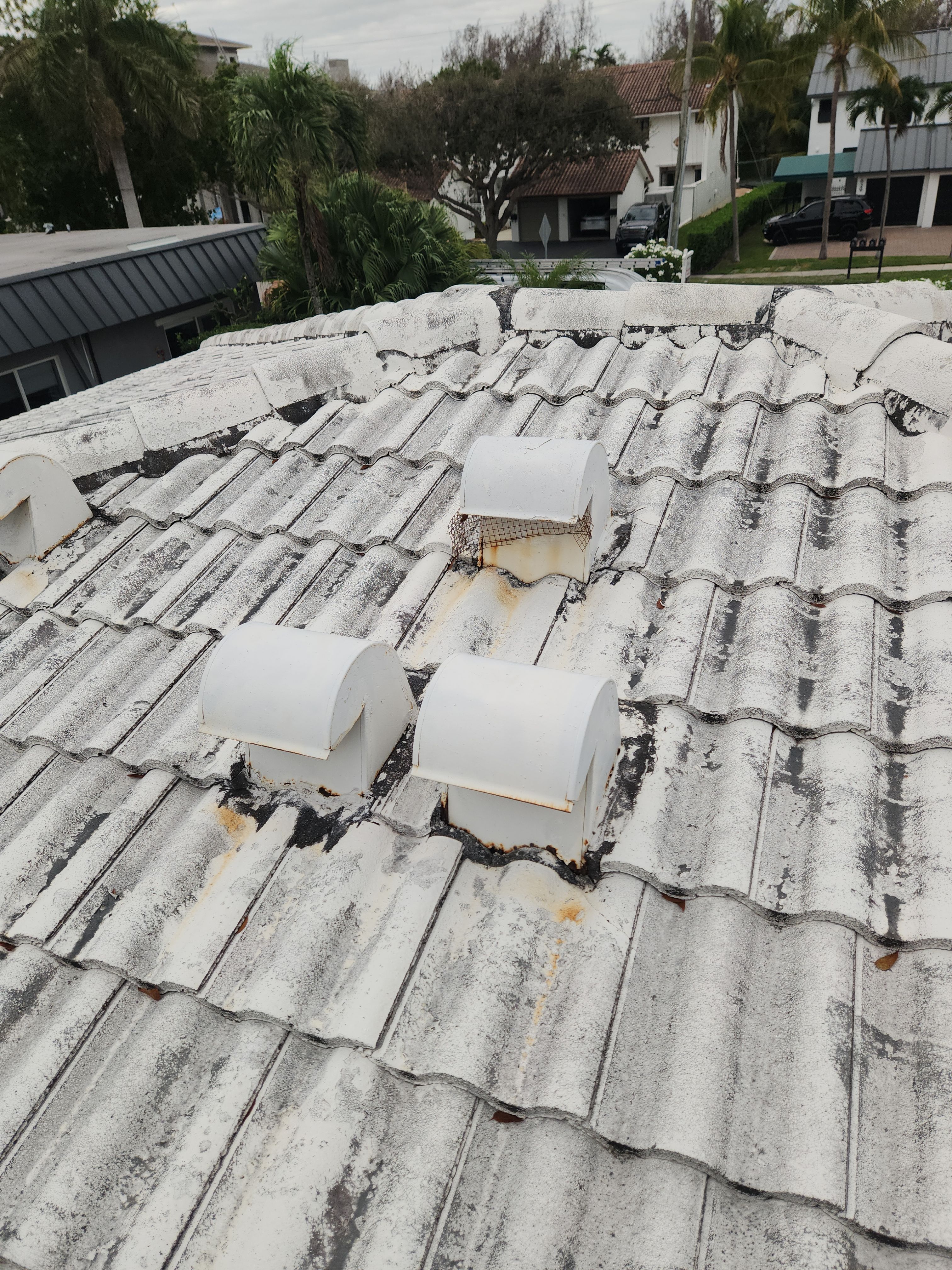 Concrete Tile Roof Repair and Vent Replacement in Deerfield Beach by Aastro Roofing