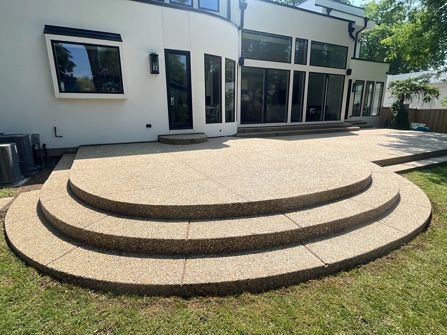 Aggregate concrete cleaning and sealing using Surebond SB-9000 by Northern Power Washing LLC.