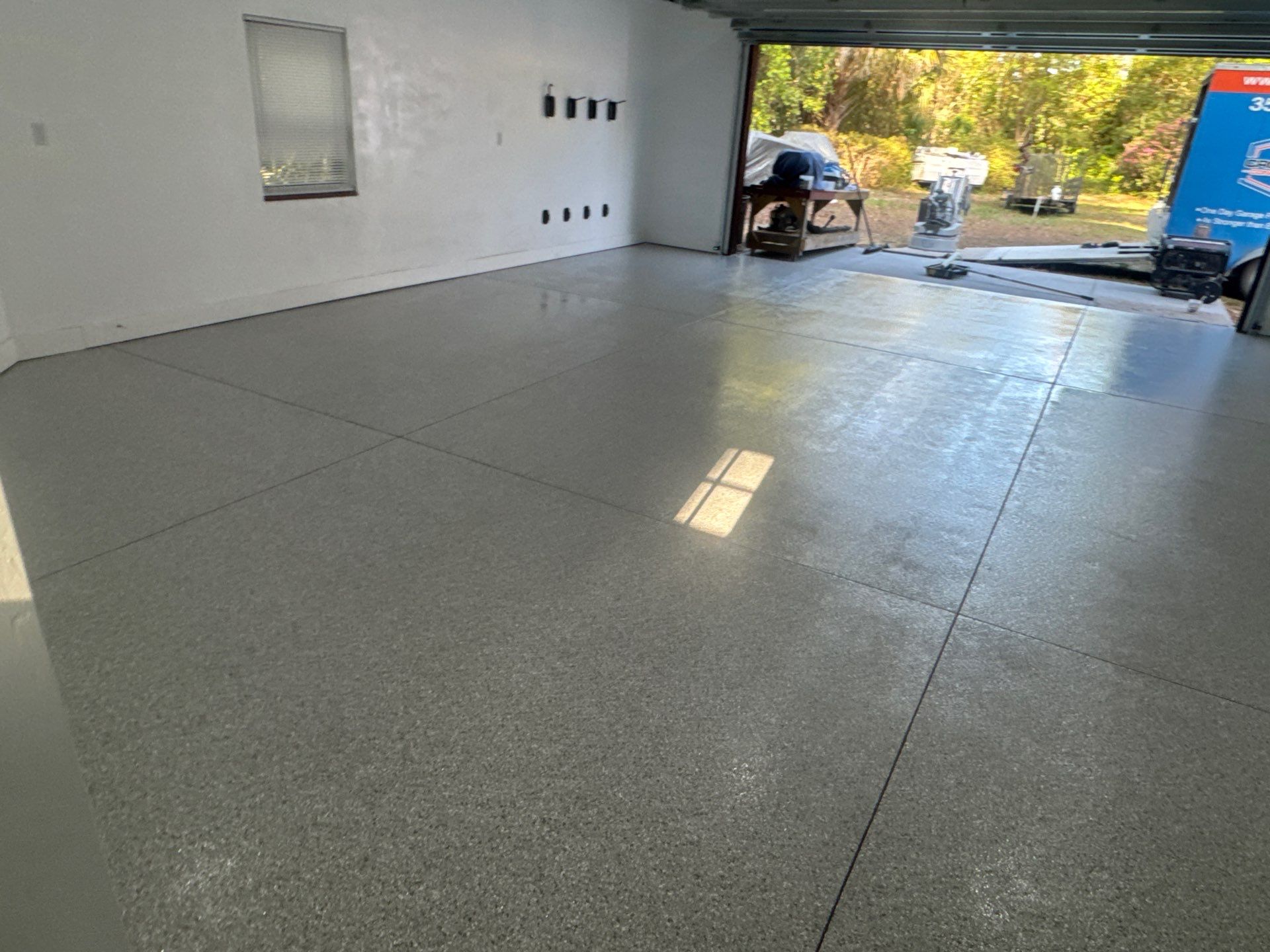 Garage Project in Mount Everest by Cross Creek Concrete Coatings